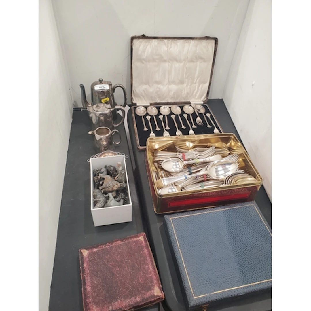 A Canteen of plated Spoons and Forks, a box of plated Cutler...