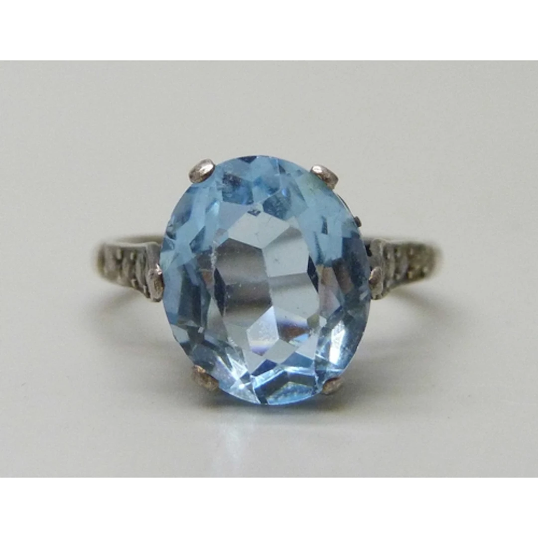 An Art Deco silver and blue paste stone ring, K