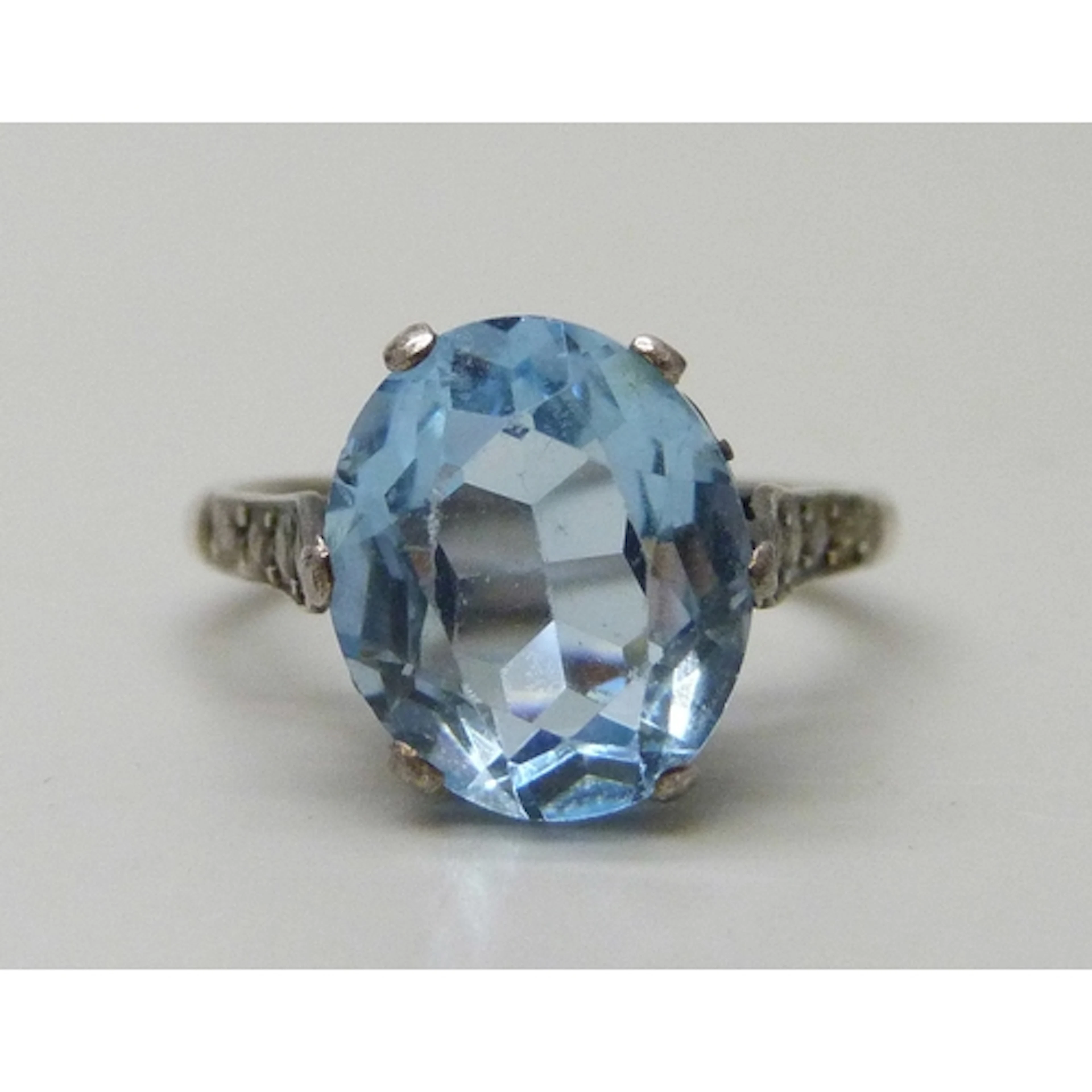 An Art Deco silver and blue paste stone ring, K