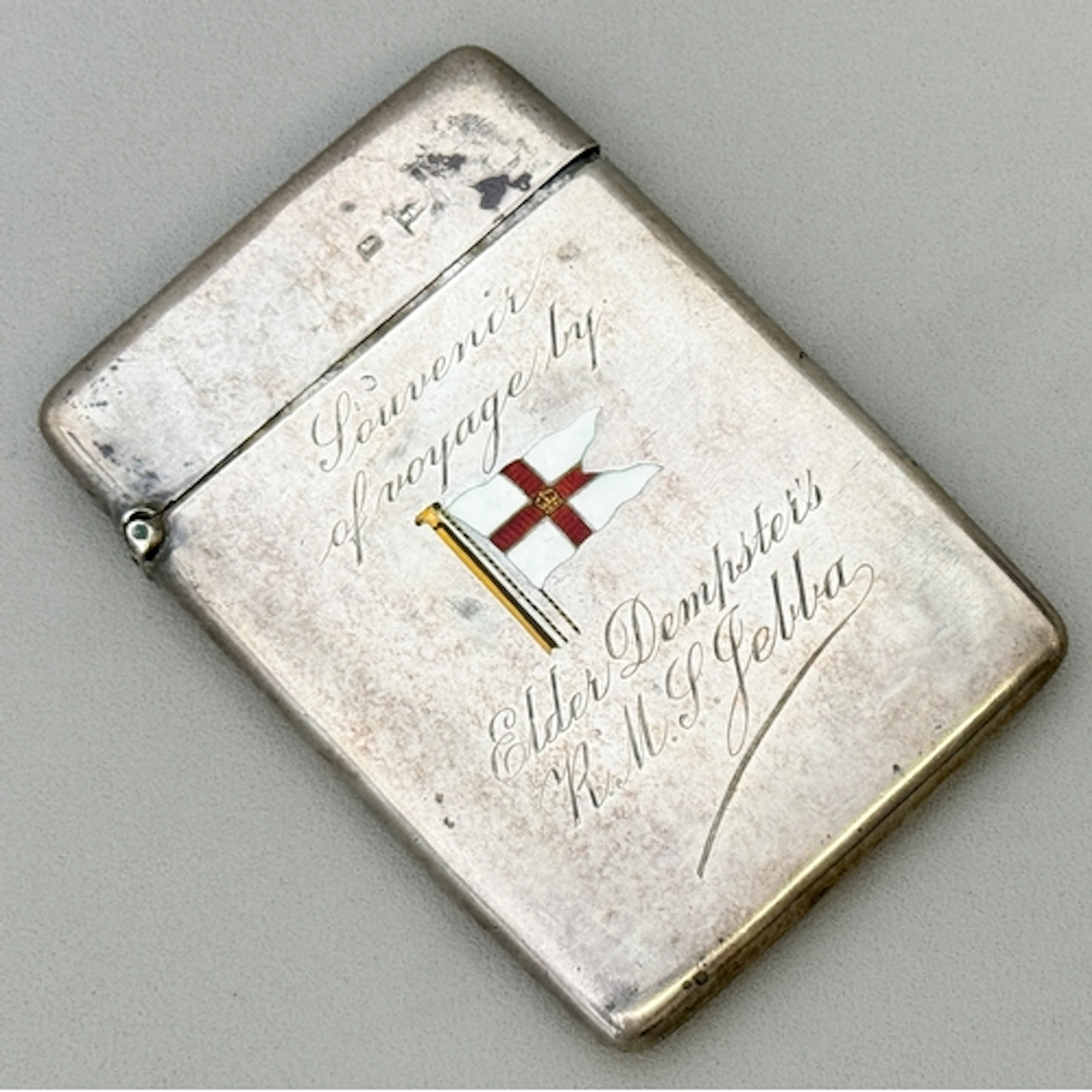 Shipping interest - a silver card case with enamel burgee fl...