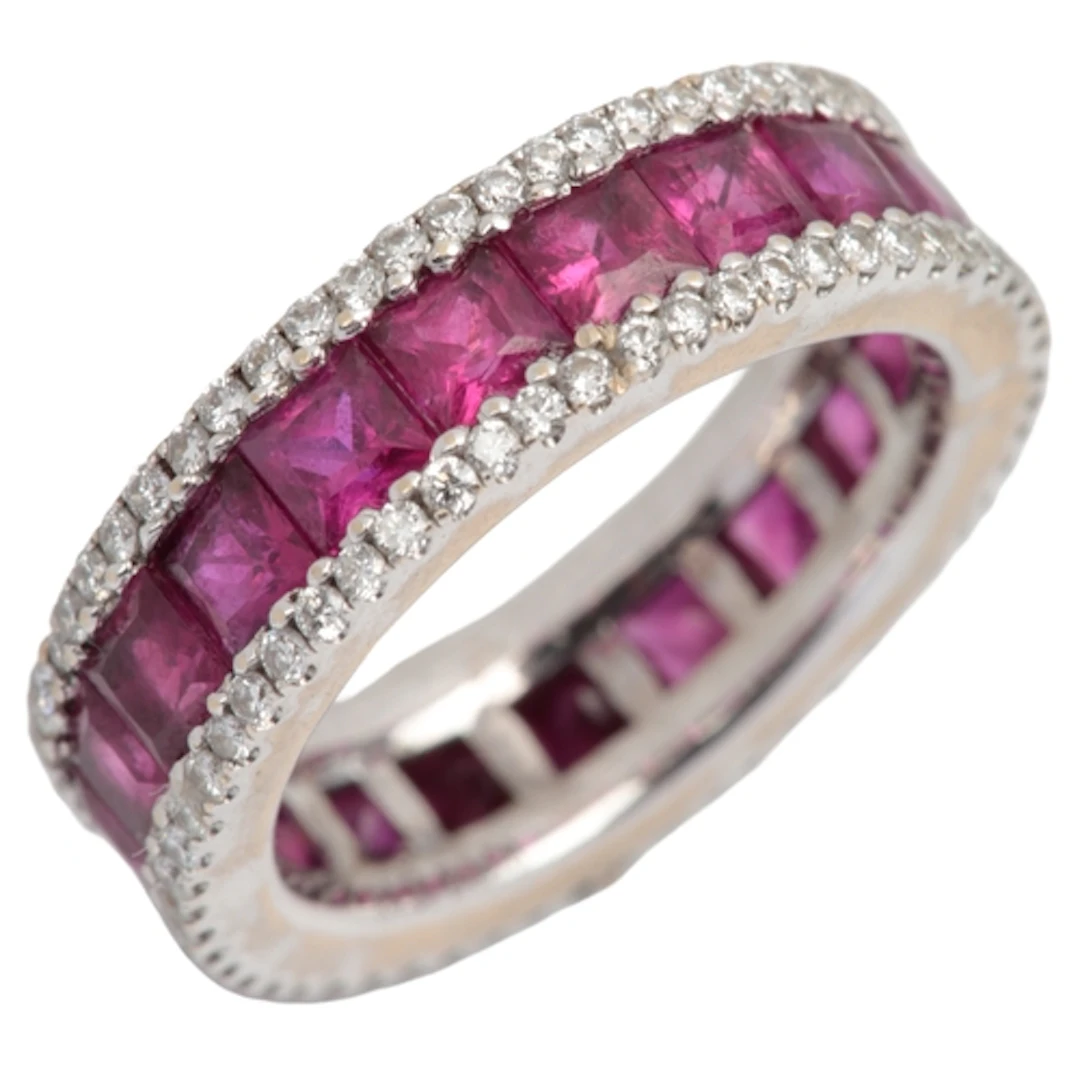 A ruby and diamond eternity ring, designed as a continuous b...