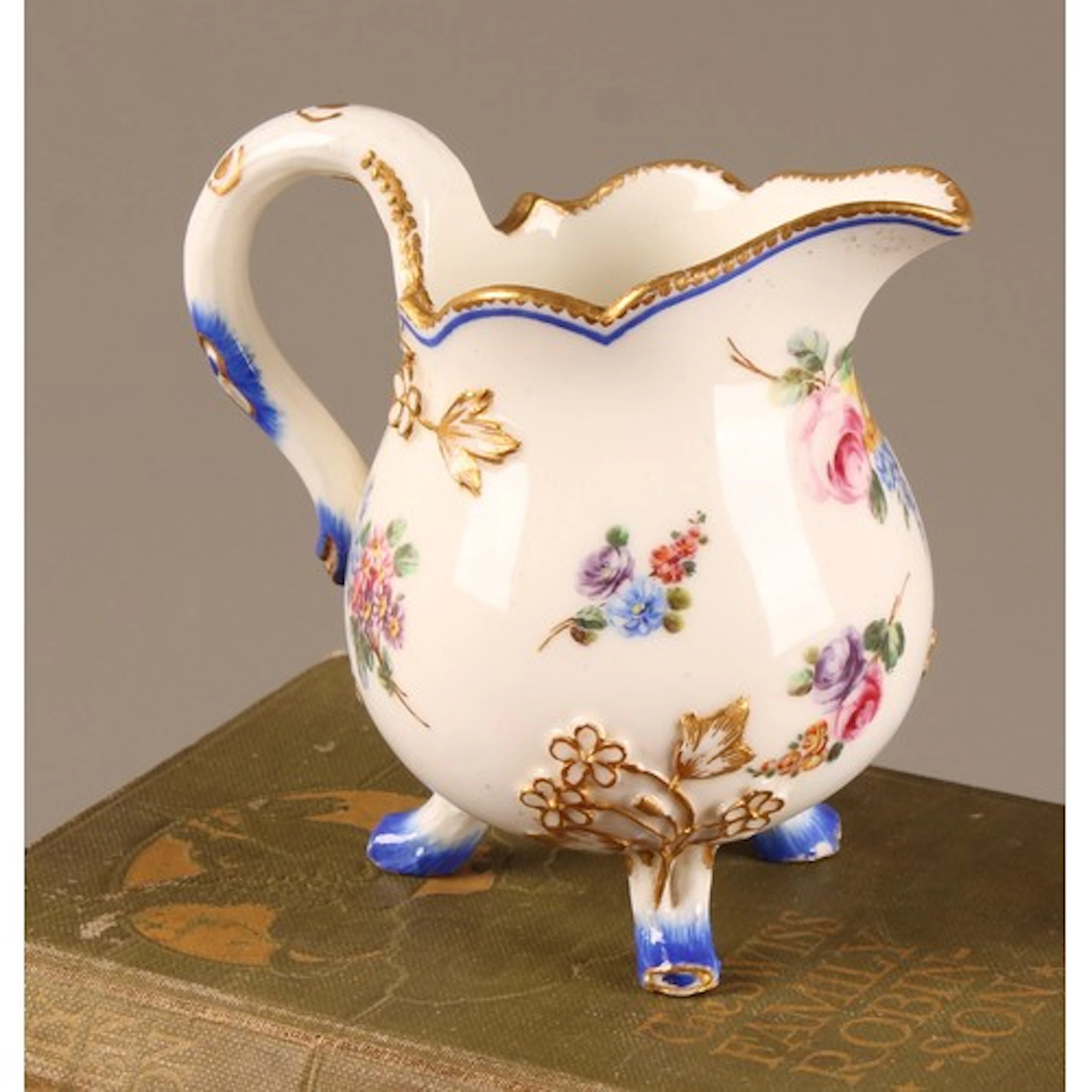 A Continental porcelain baluster cream jug, probably Sevres,...
