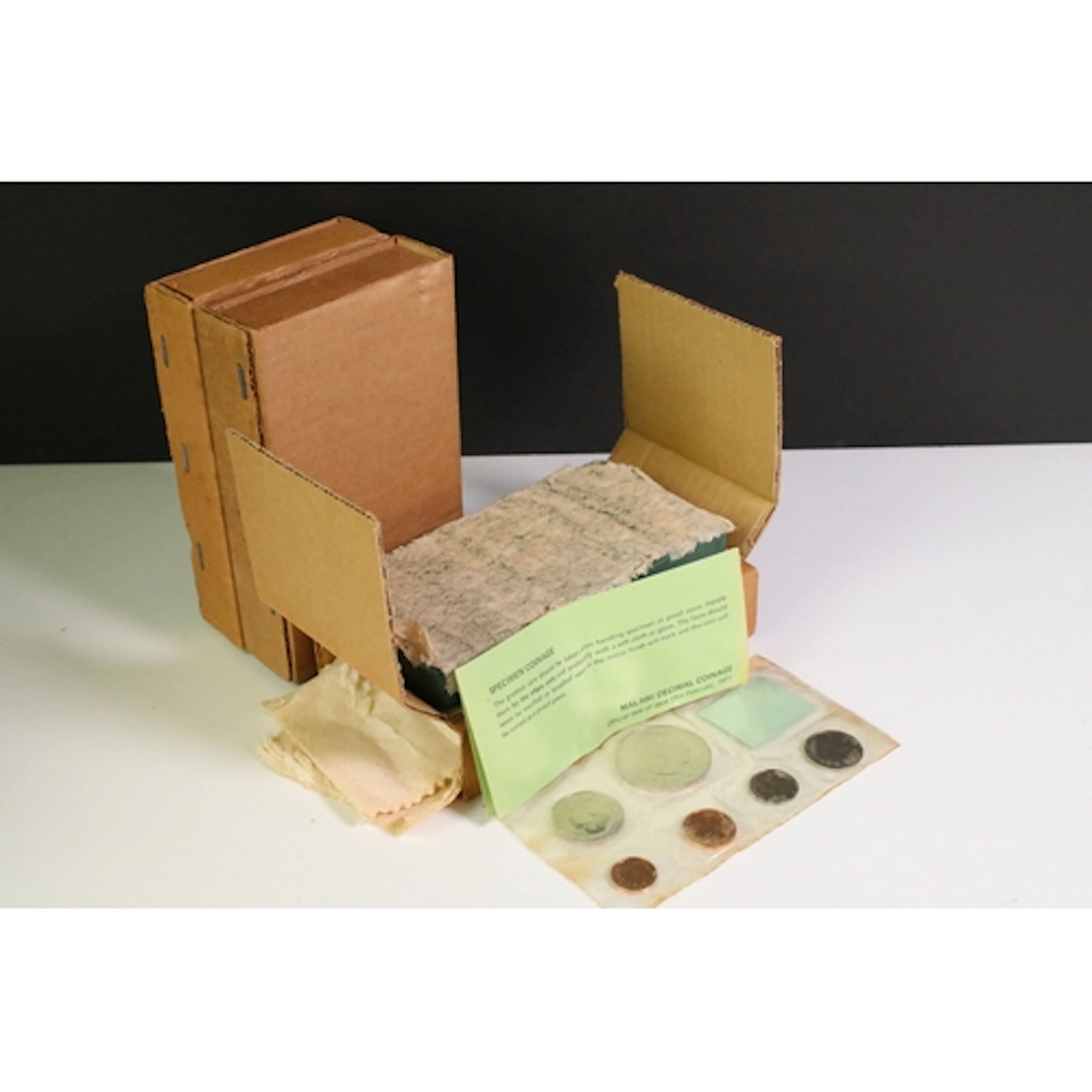 A collection of three Royal Mint first decimal coins of Mala...
