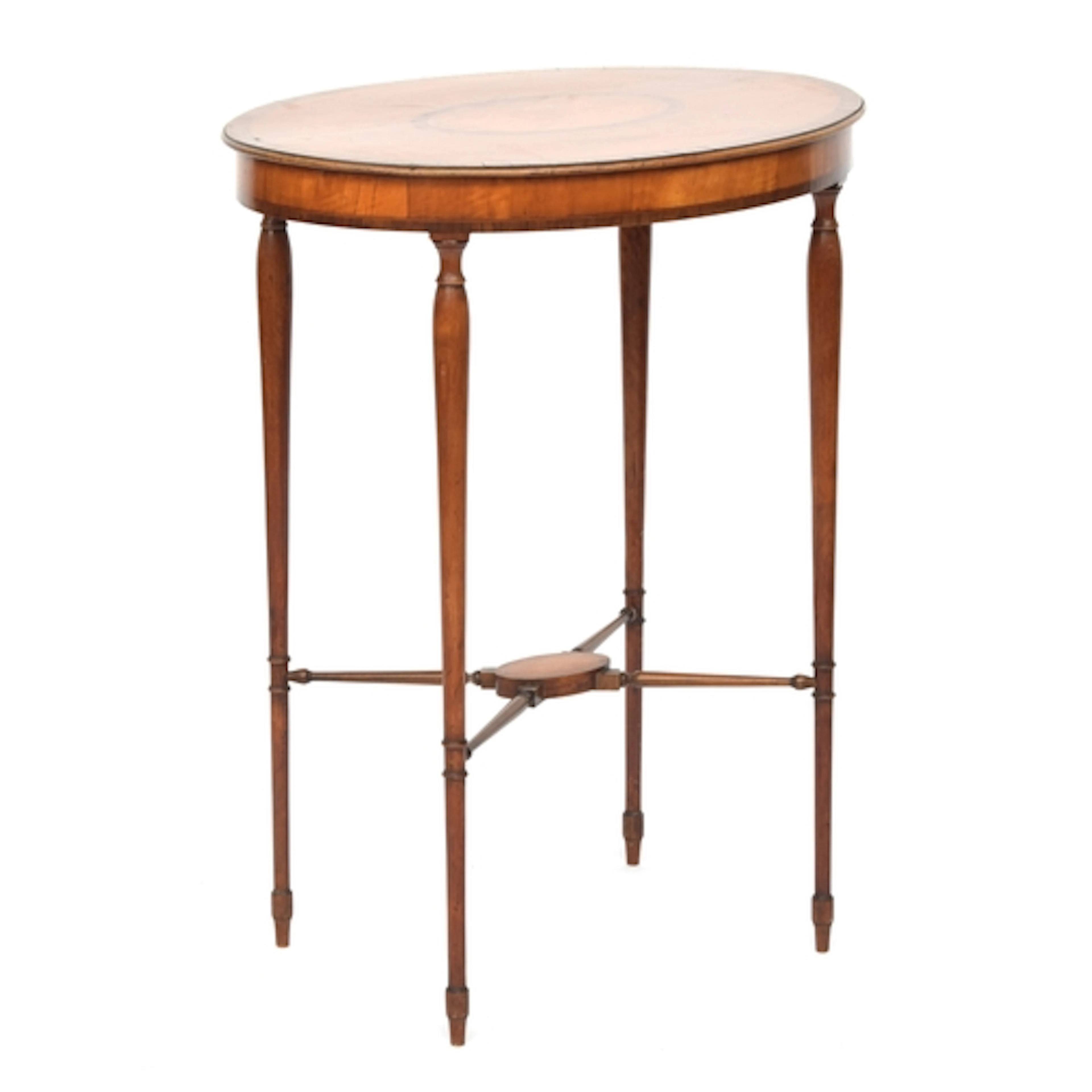 A satinwood and crossbanded oval lamp table on slender turne...