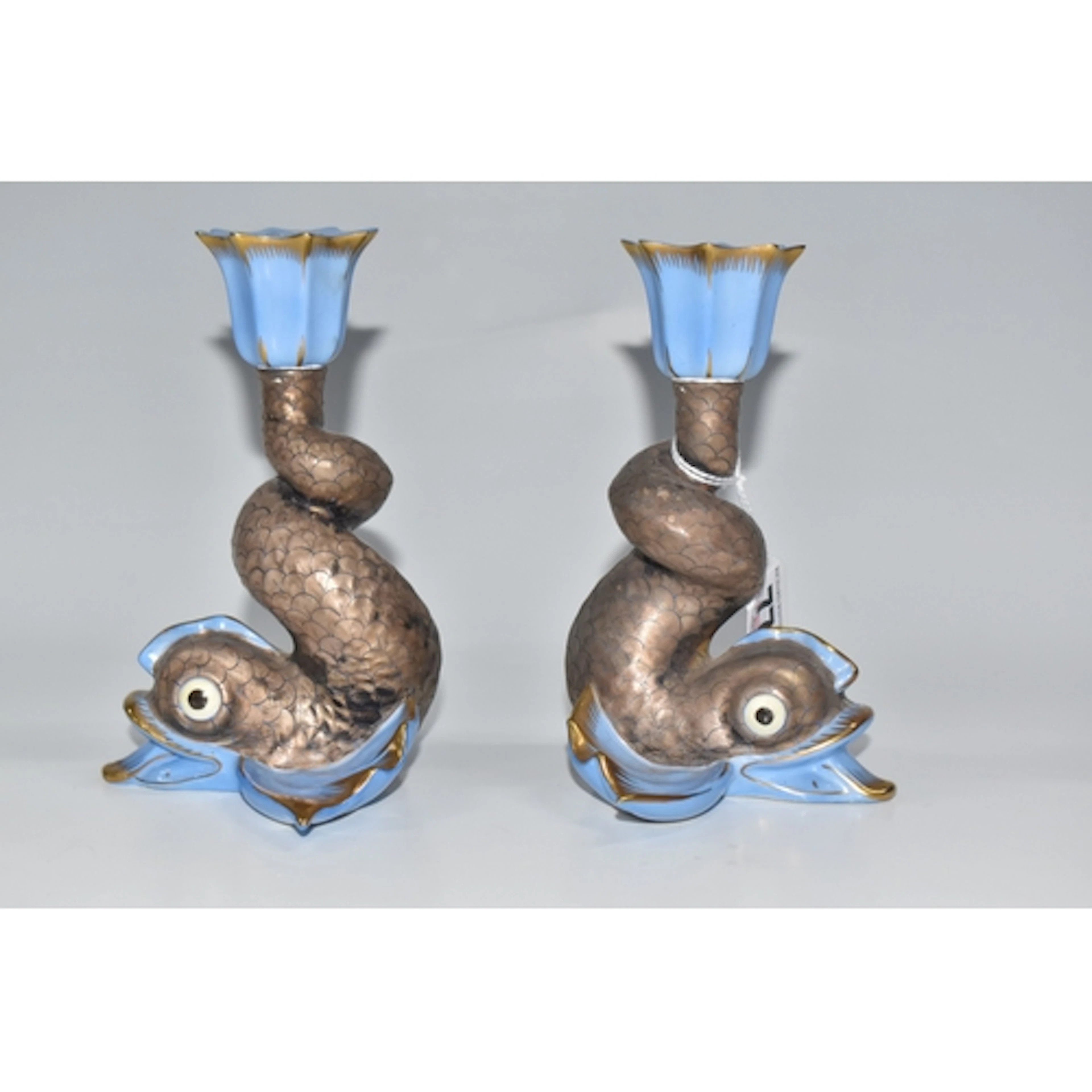 A PAIR OF HAND PAINTED HEREND PORCELAIN DOLPHIN CANDLEHOLDER...