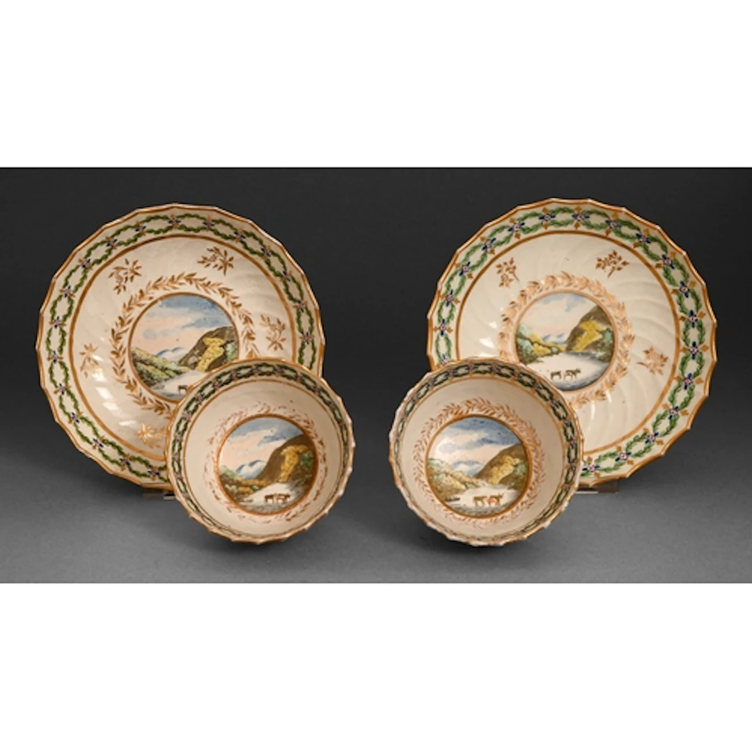 A pair of Caughley spirally fluted tea bowls and saucers, c1...