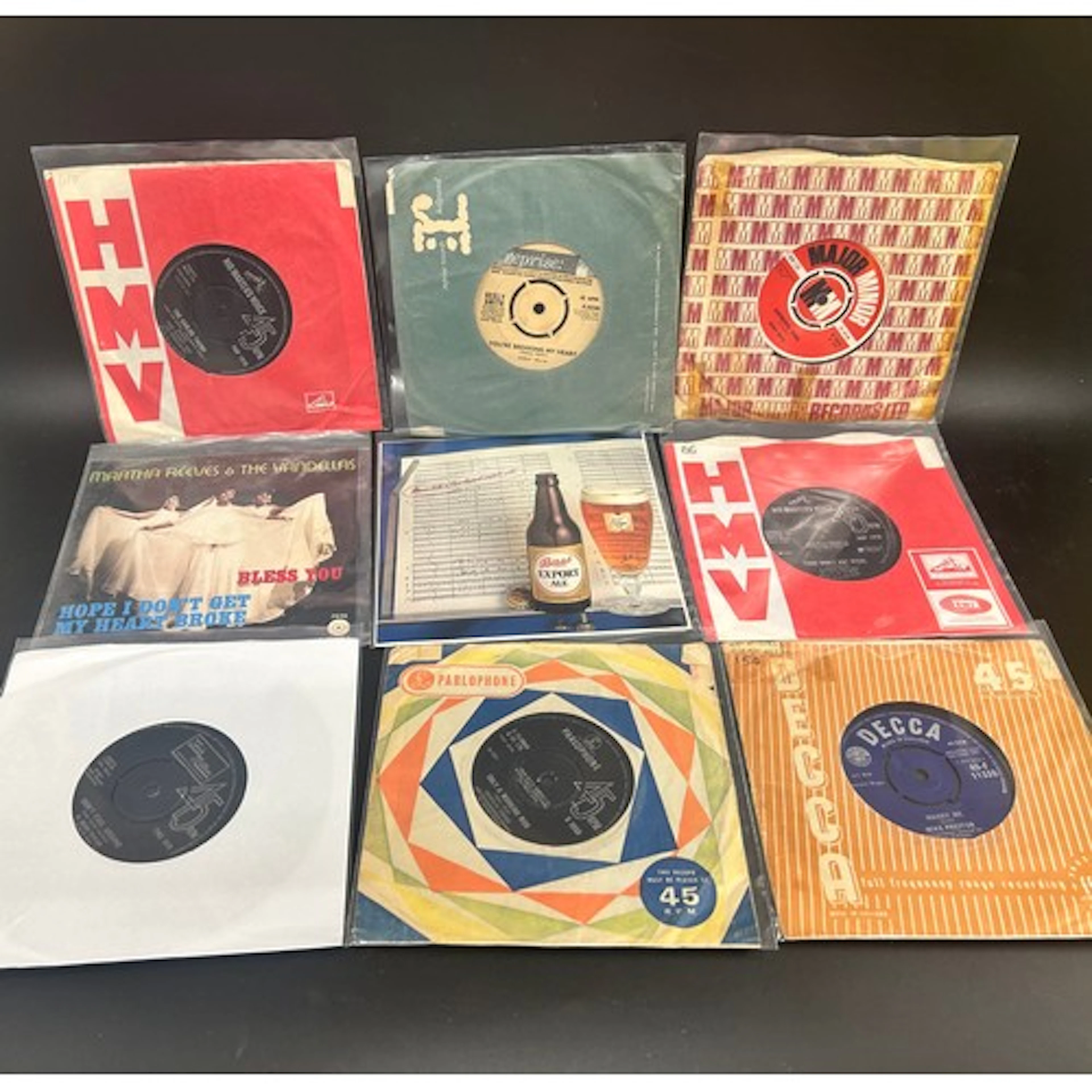 Collection of assorted vinyl singles to include Martha Reeve...