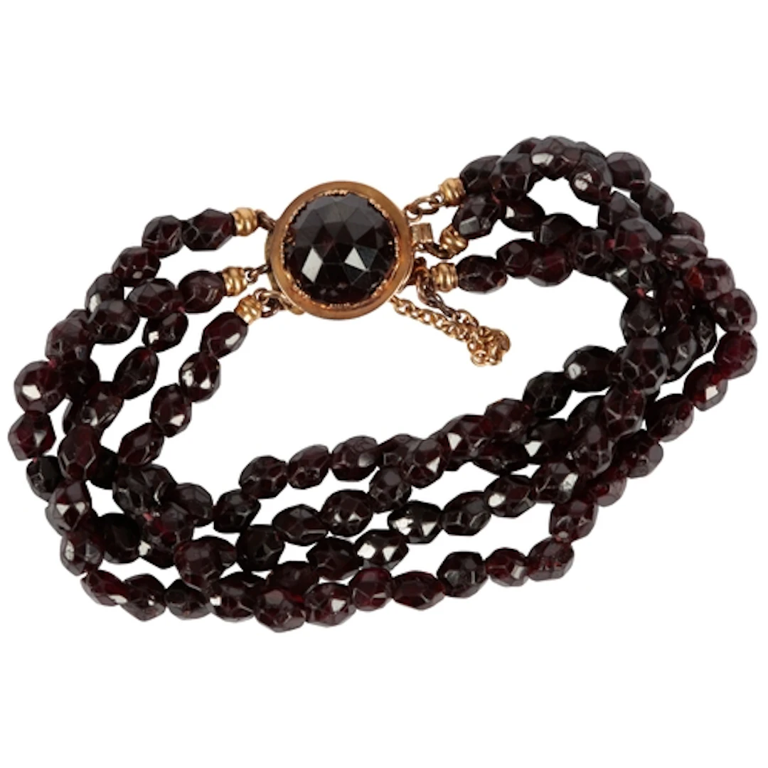 A Victorian garnet bracelet, late 19th century, composed of ...