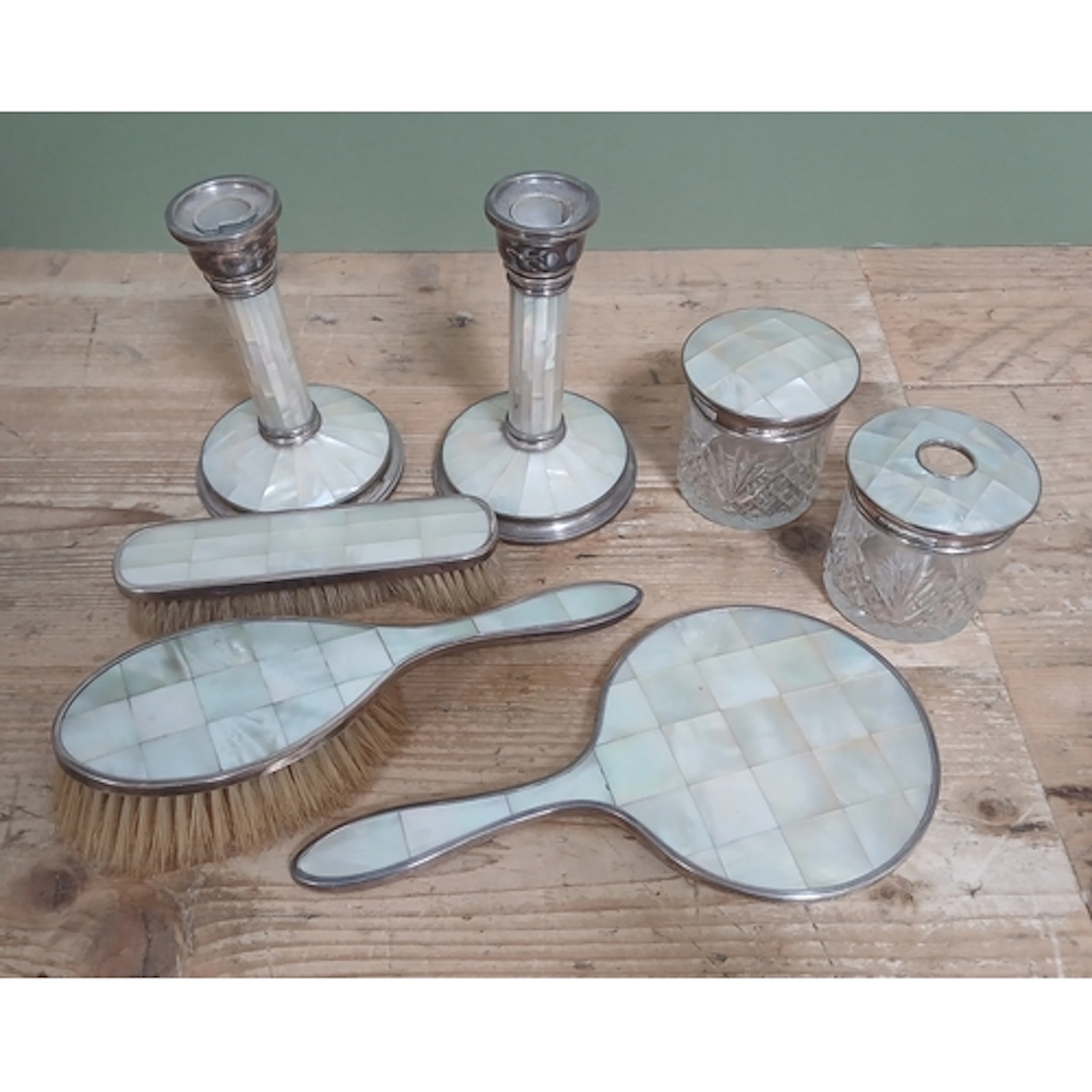 A George V Art Deco style mother of pearl and silver dressin...