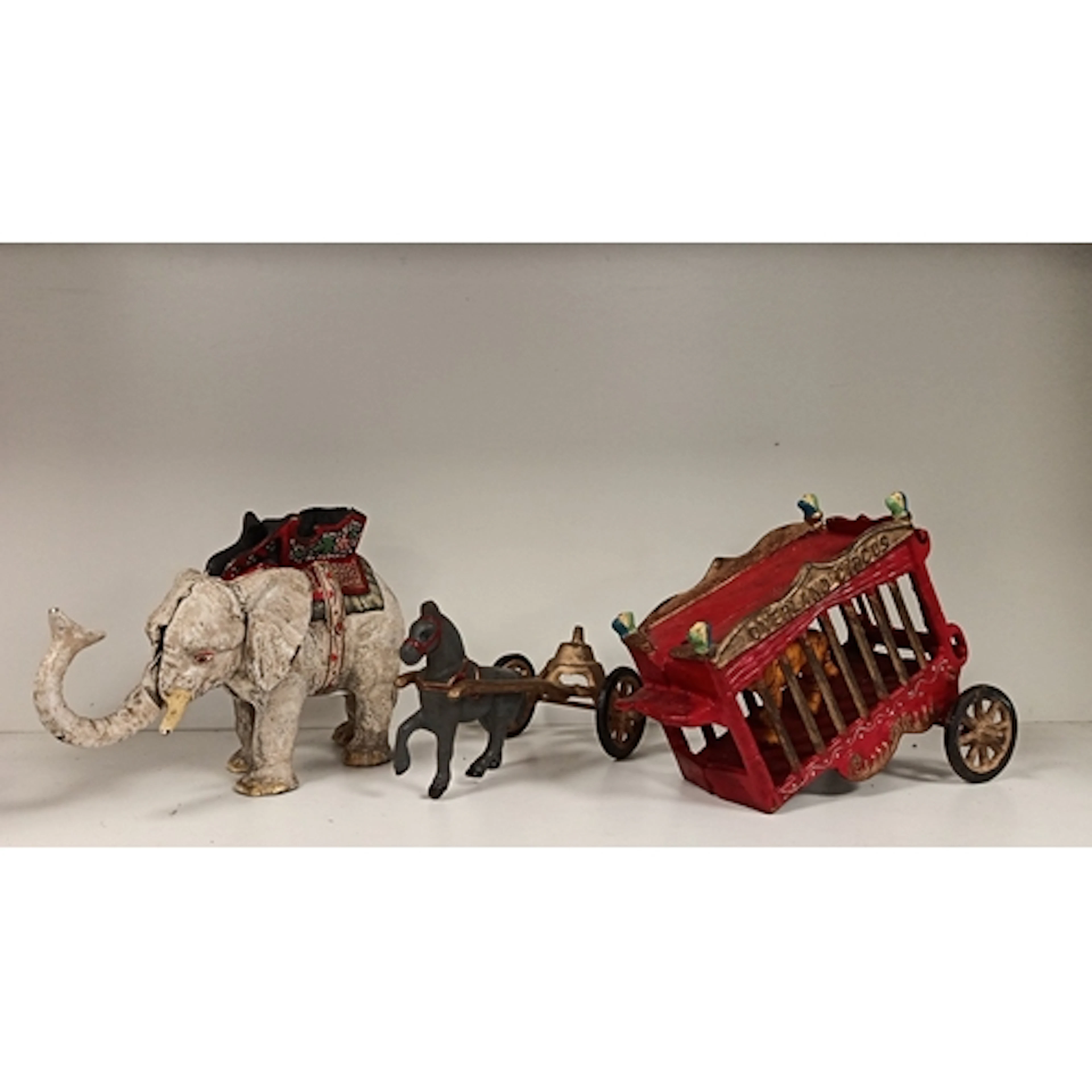 Cast Iron circus animal toys including elephant, horse cart...