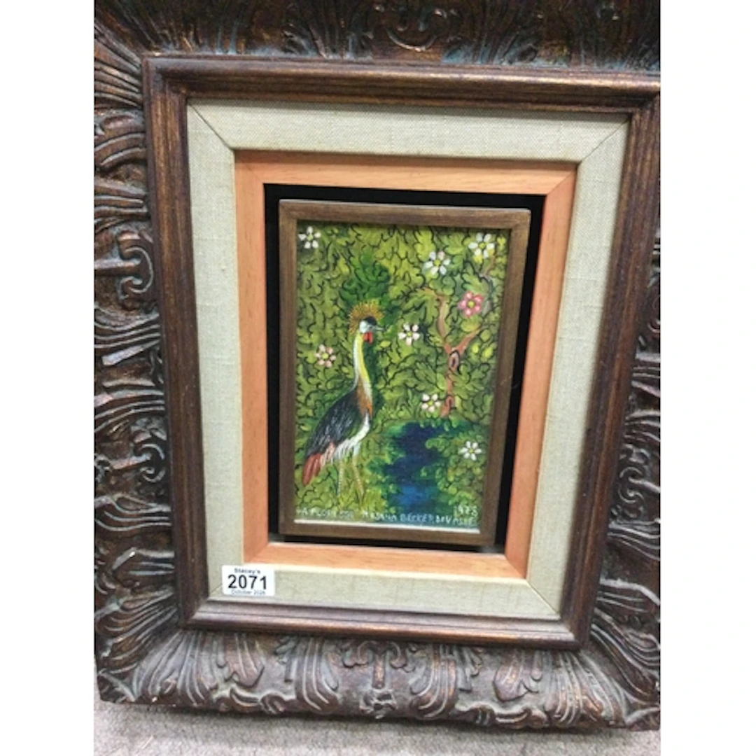Framed oil on canvas depicting a peacock in landscape, signe...