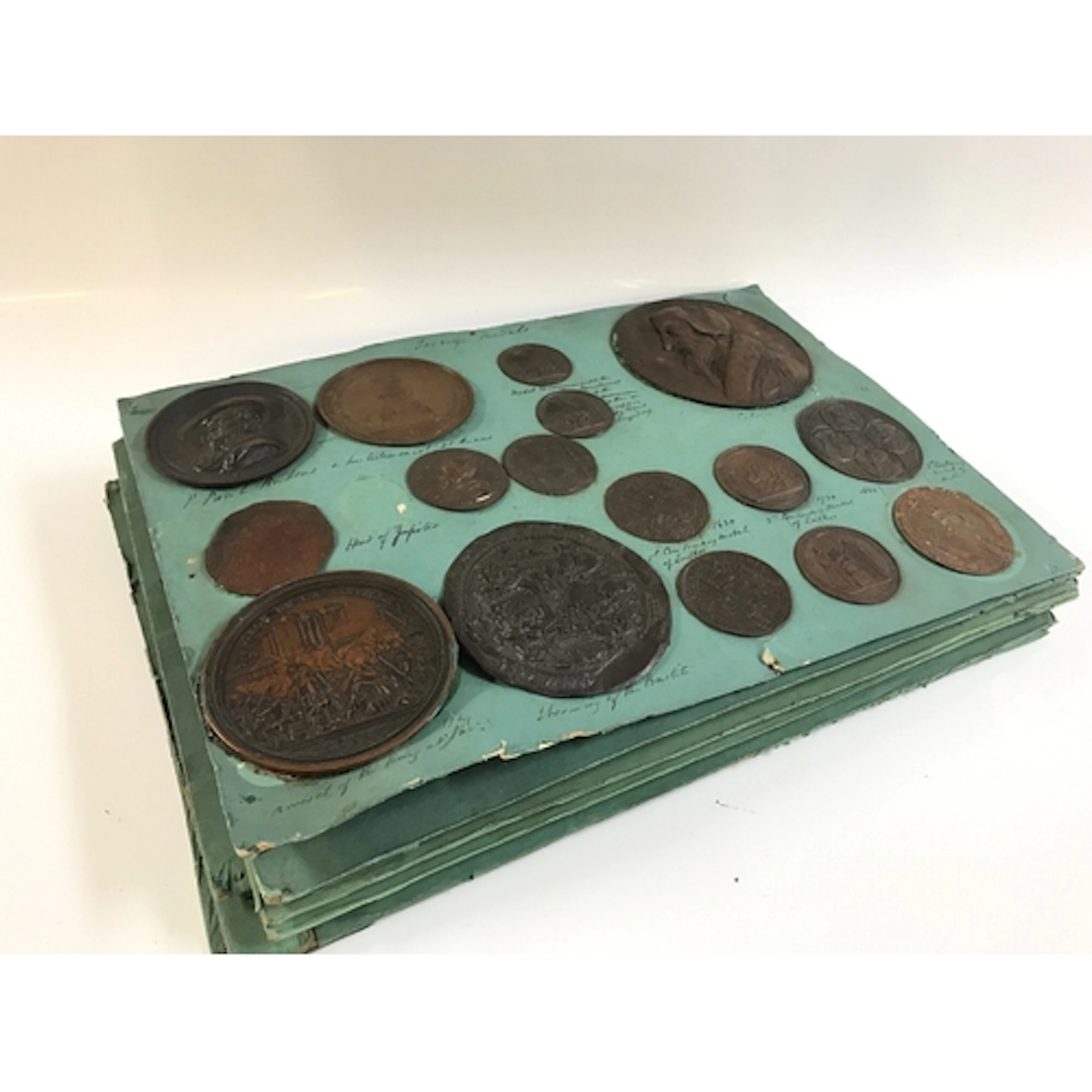 An interesting collection of Victorian bronze finished plaqu...