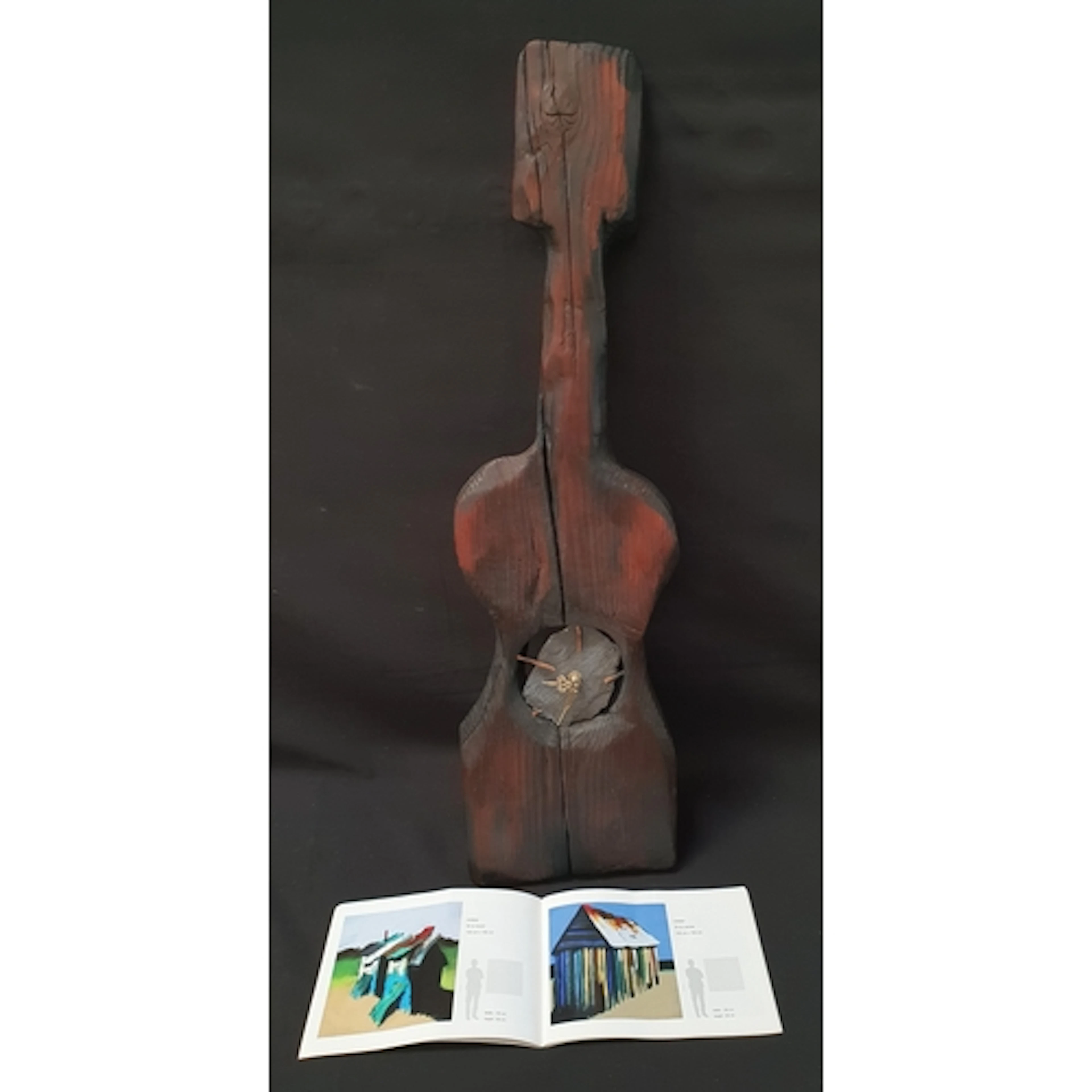 GARRY BRANDER CARVED CLOCK the carved and painted oak in the...