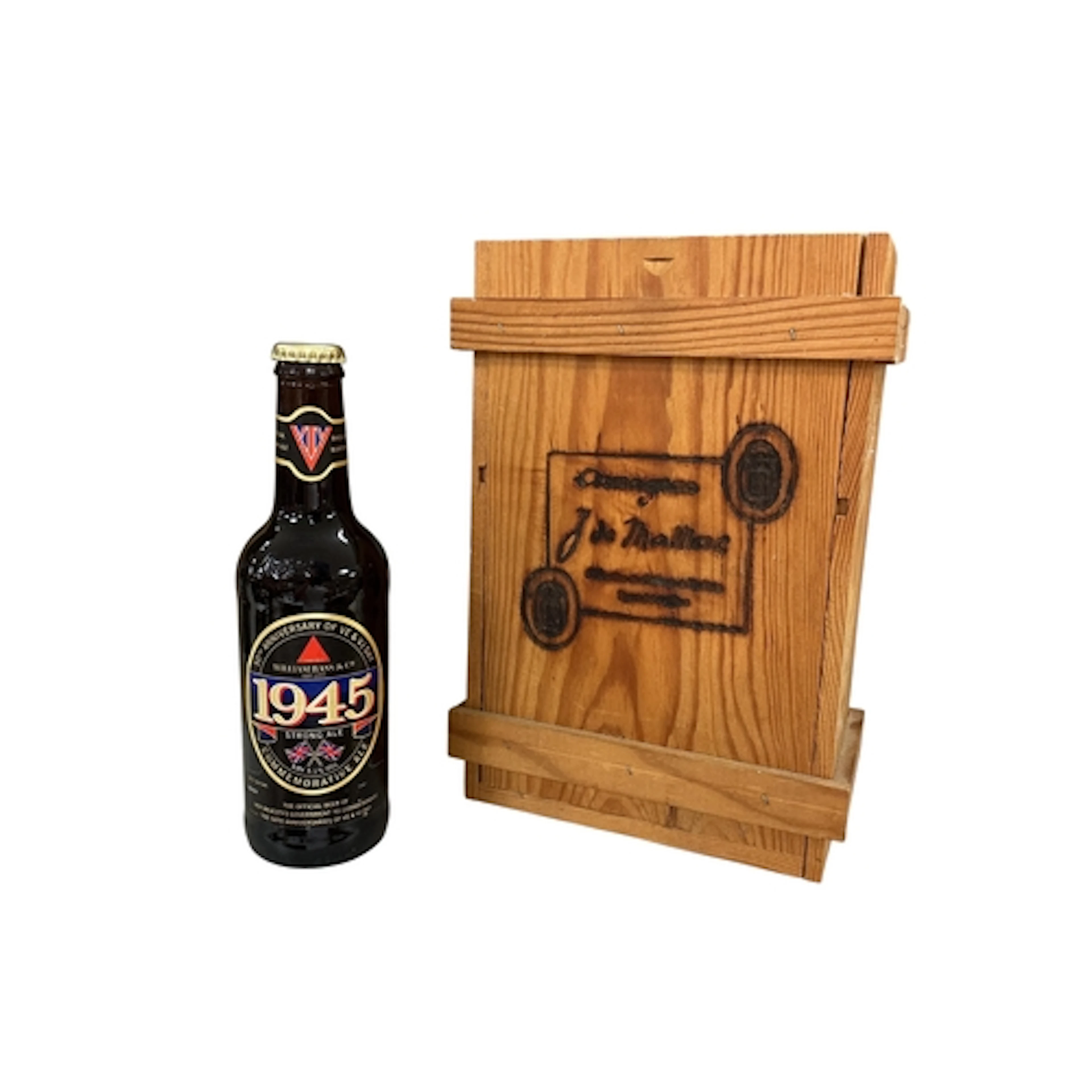 A bottle of J de Malliac Armagnac in pine presentation box a...