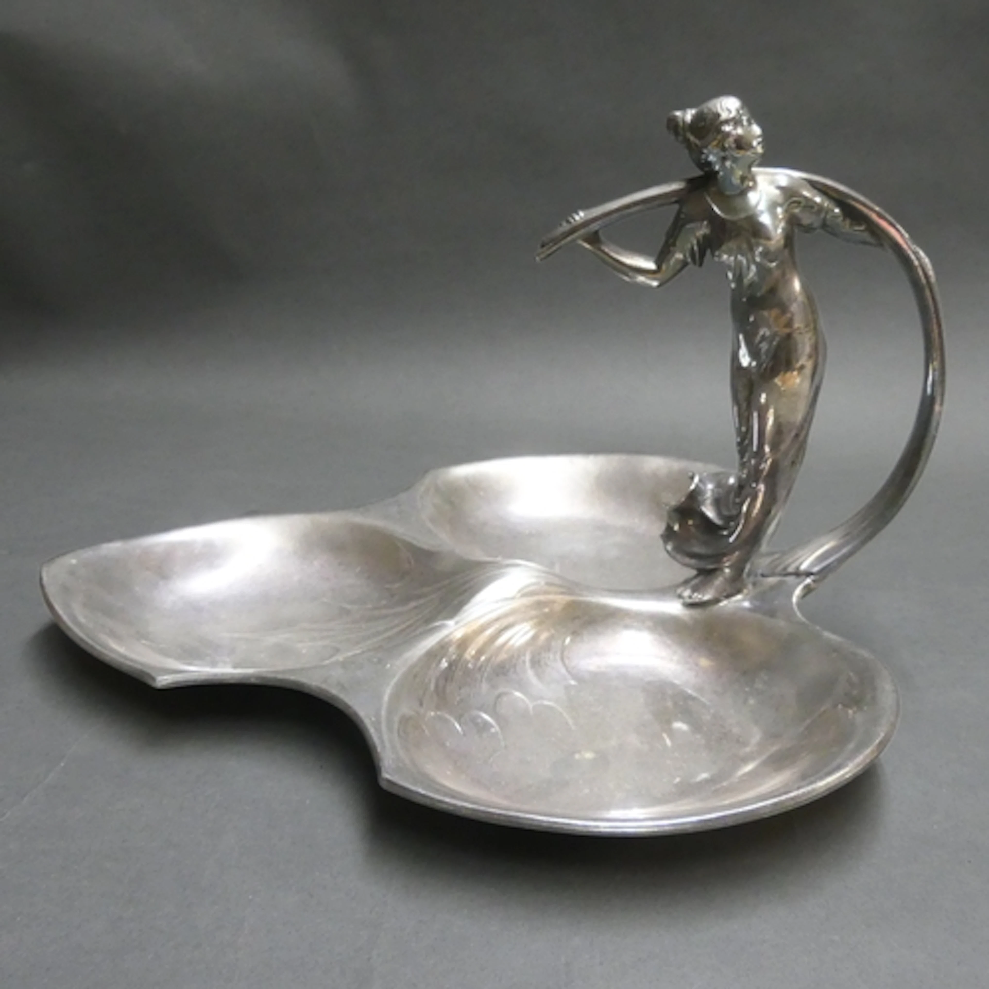 An Art Nouveau silver plated triple fruit bowl, likely WMF d...