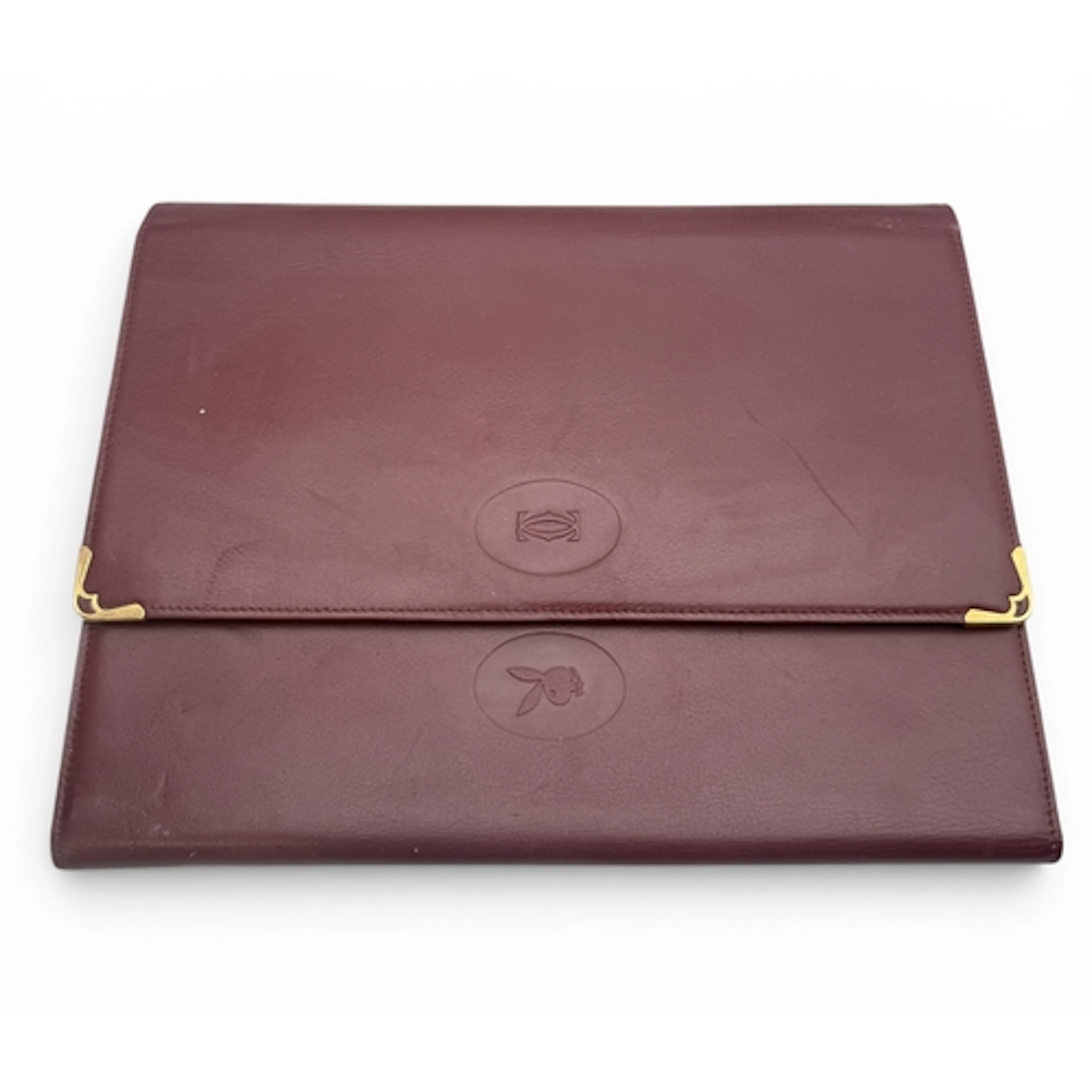 THE PLAYBOY AND CLERMONT CLUBS: A CARTIER BURGANDY LEATHER F...