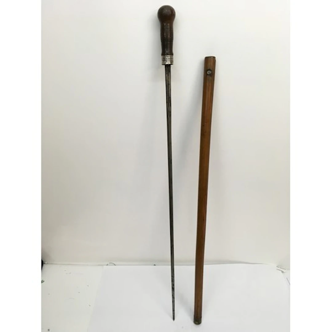 A Victorian sword stick with white metal mount