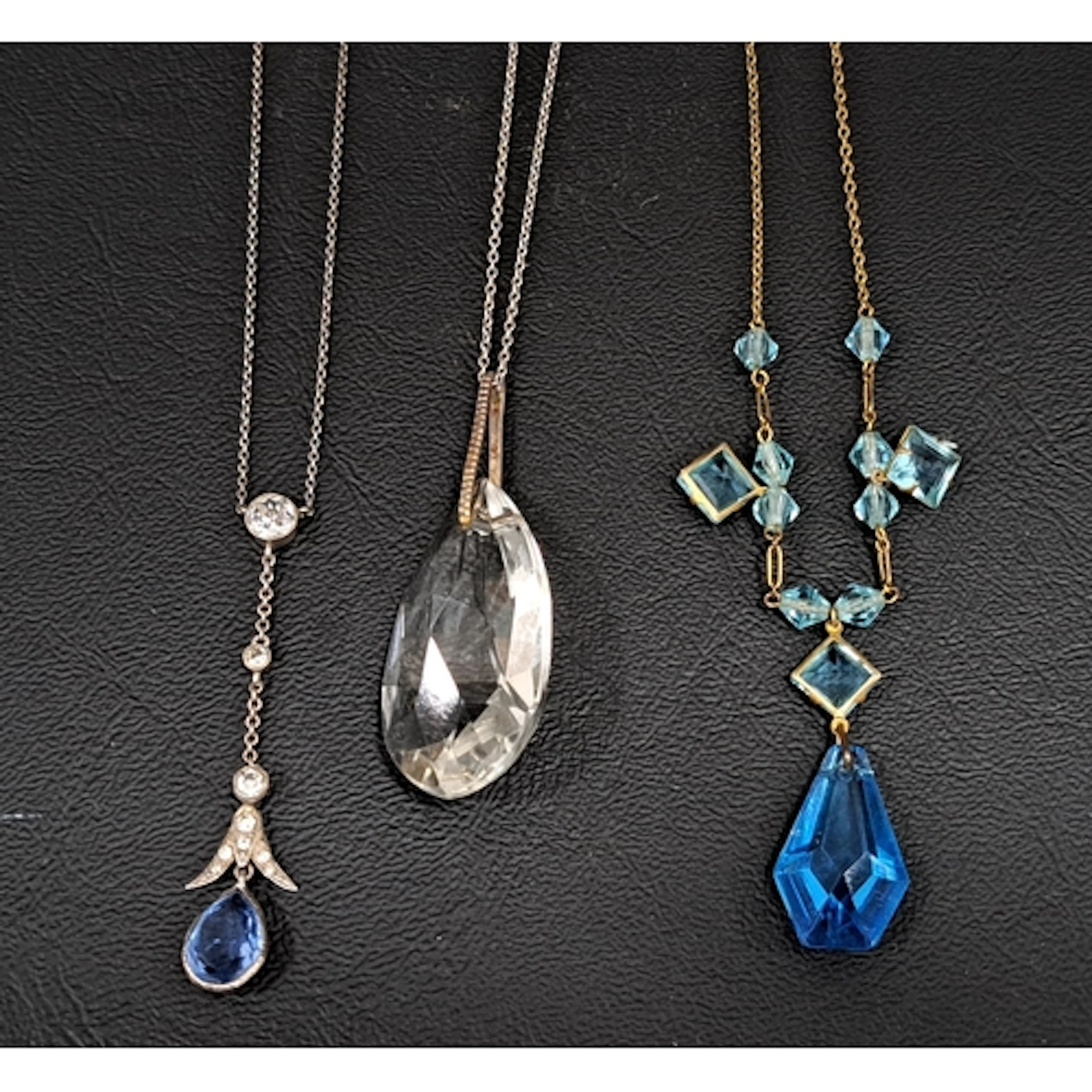 THREE VINTAGE NECKLACES all with faceted coloured and clear ...