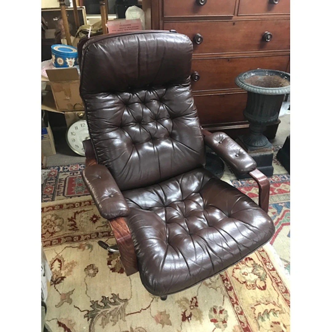 Two vintage mid-century Swedish lounge armchairs in brown le...