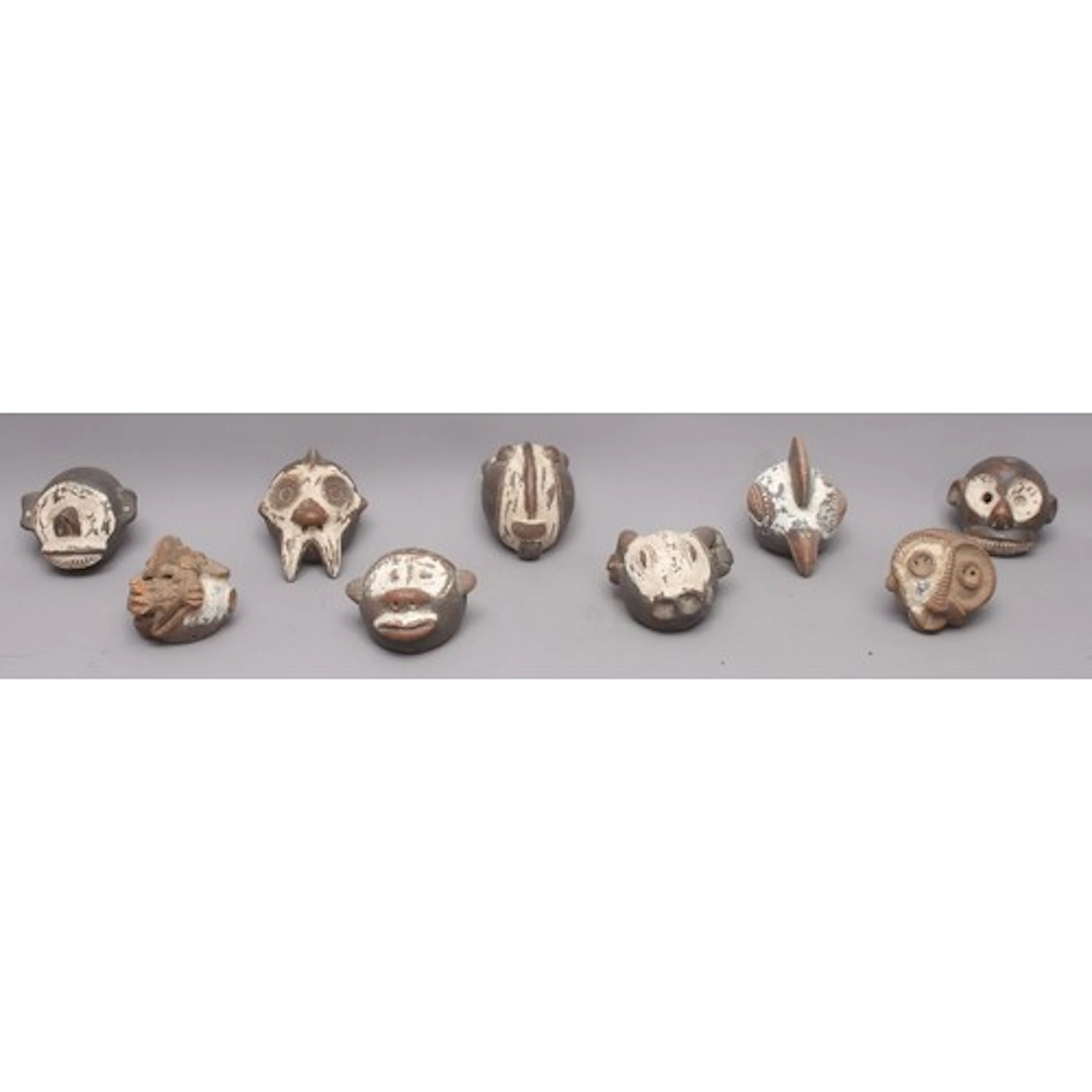 Tribal Art - a collection of nine African Tikar terracotta p...