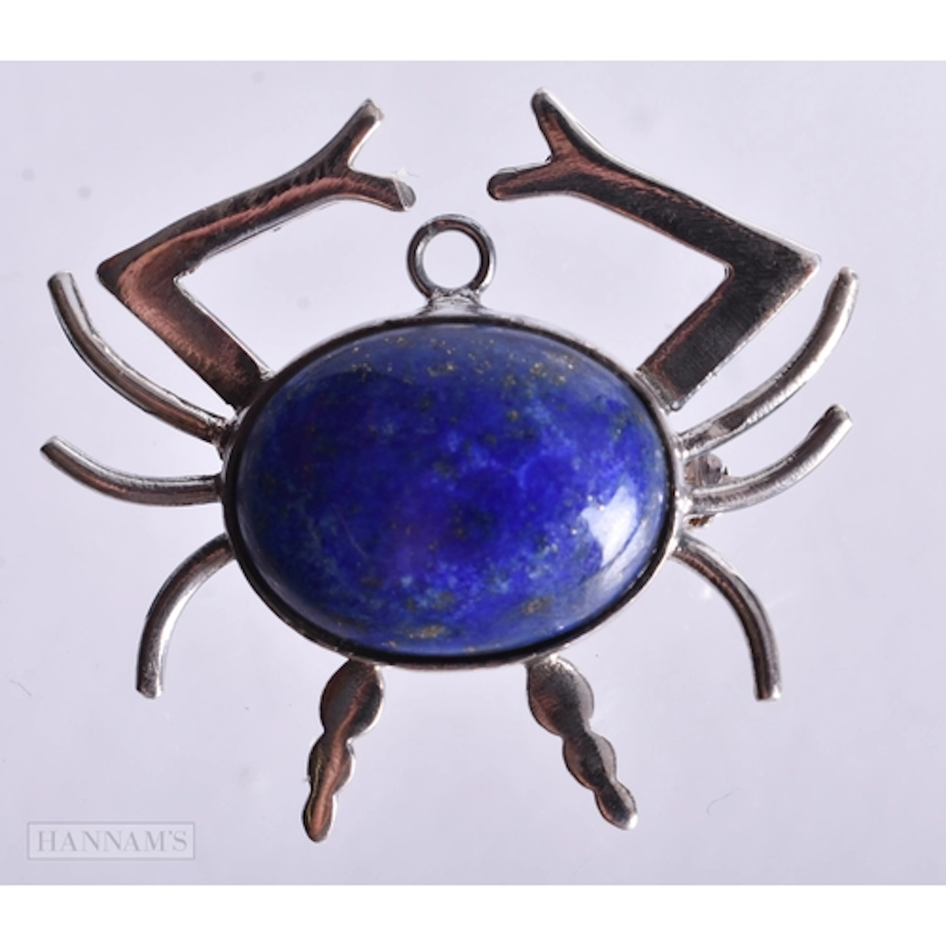 A Sterling Silver and Hardstone Spider Brooch. 2.7cm x 3cm,...