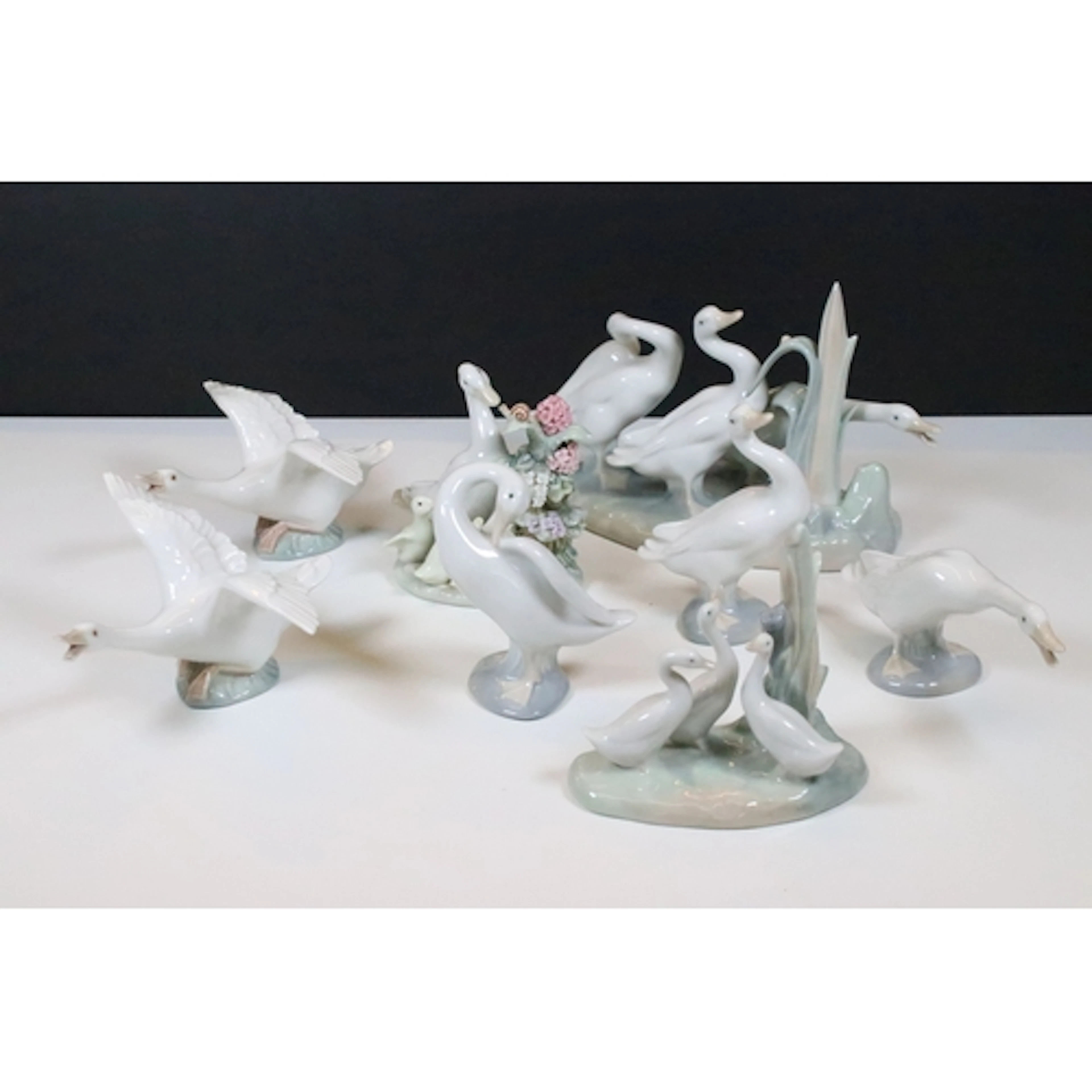 Collection of seven Lladro figures, all depicting geese, to ...
