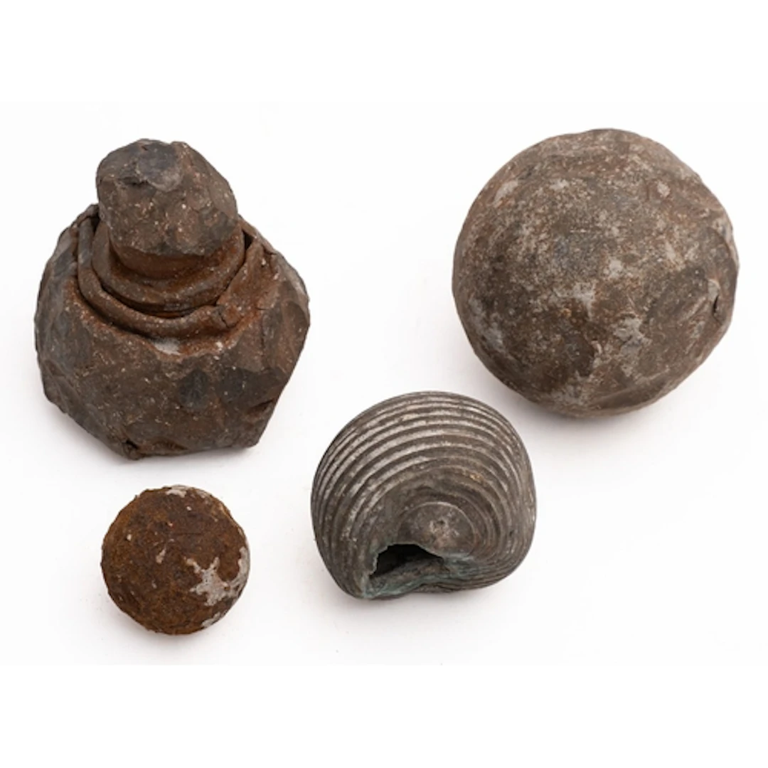 A cast lead cannon ball. 9cm diameter, together with a cast ...