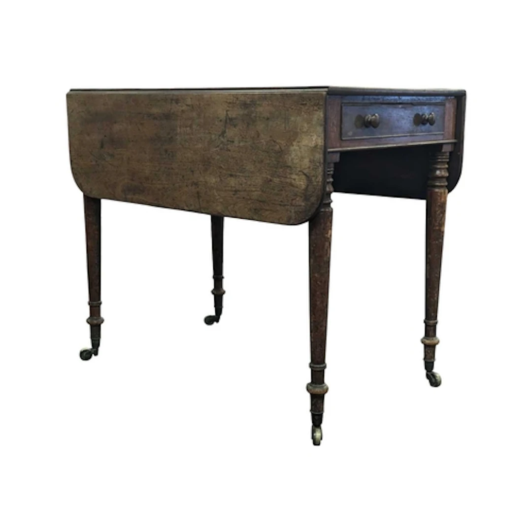 A 19th century George III mahogany pembroke table. Raised on...