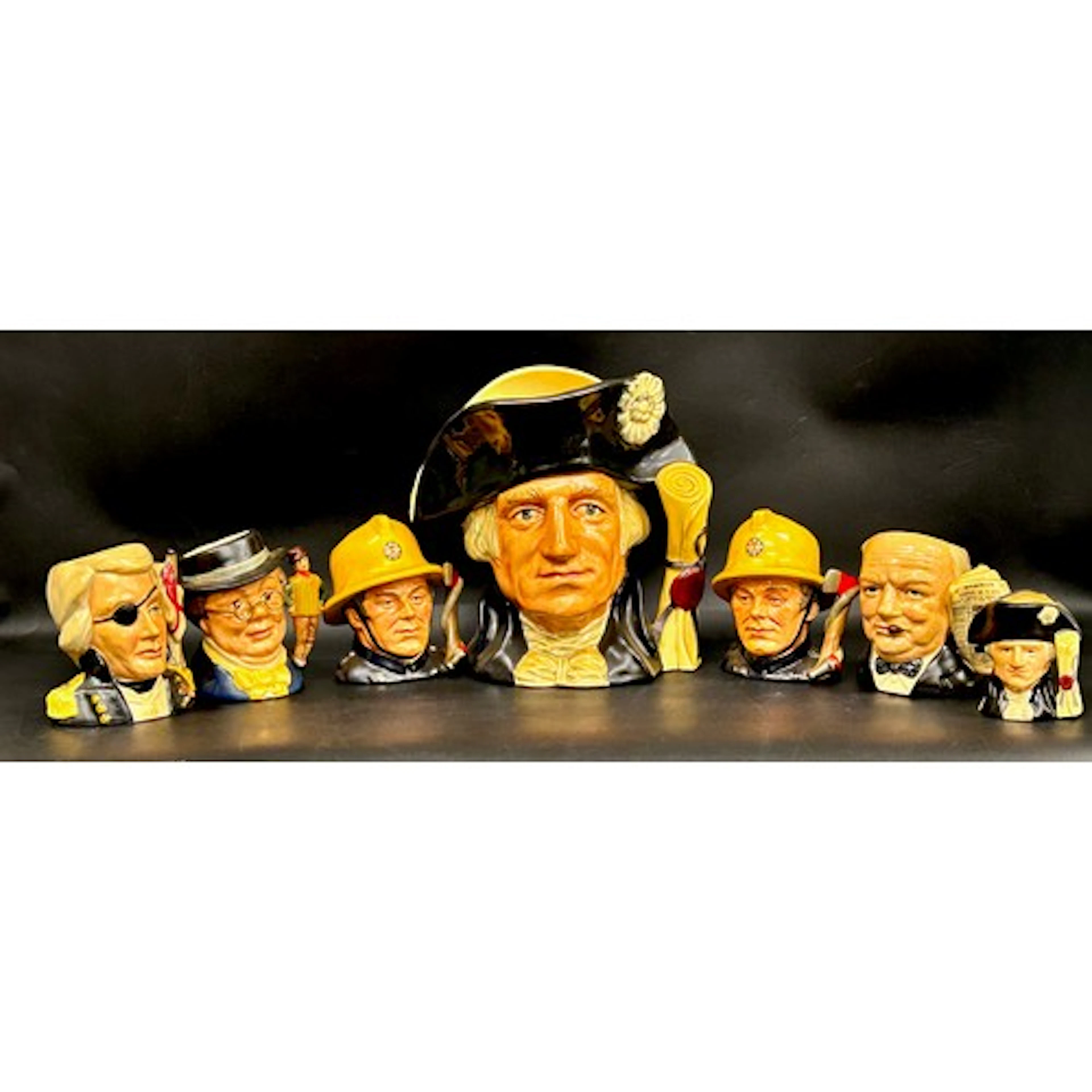 Collection of Royal Doulton character jugs to include a larg...