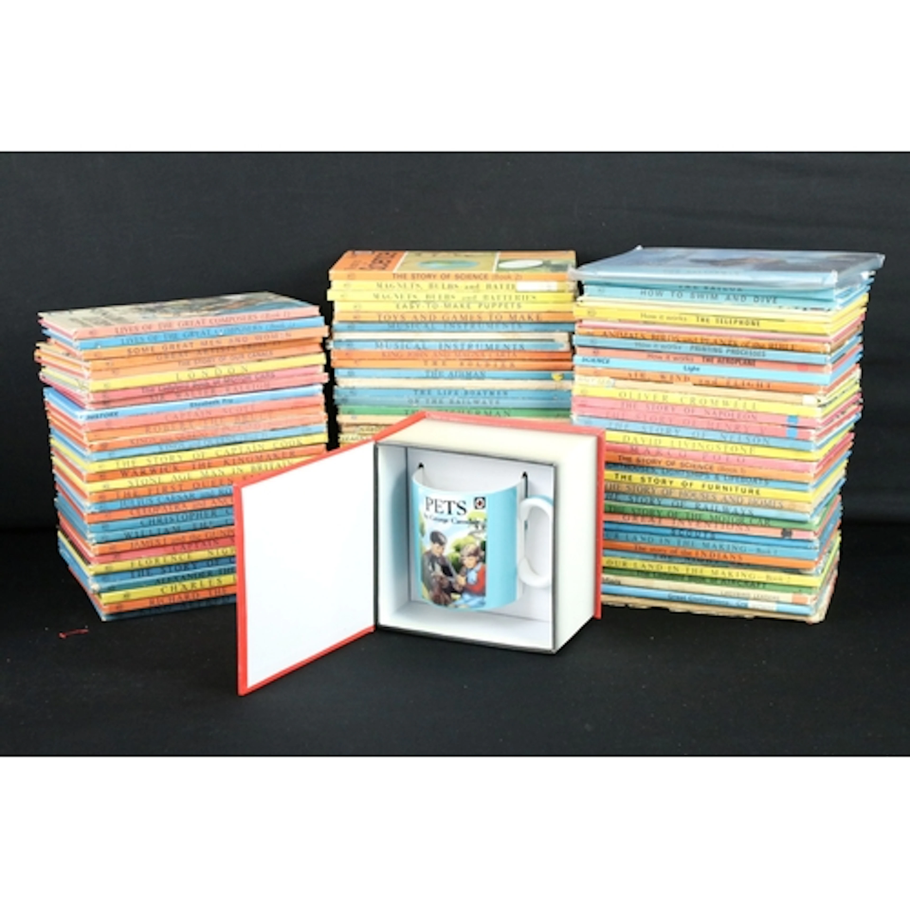 A large collection of vintage ladybird books together with a...