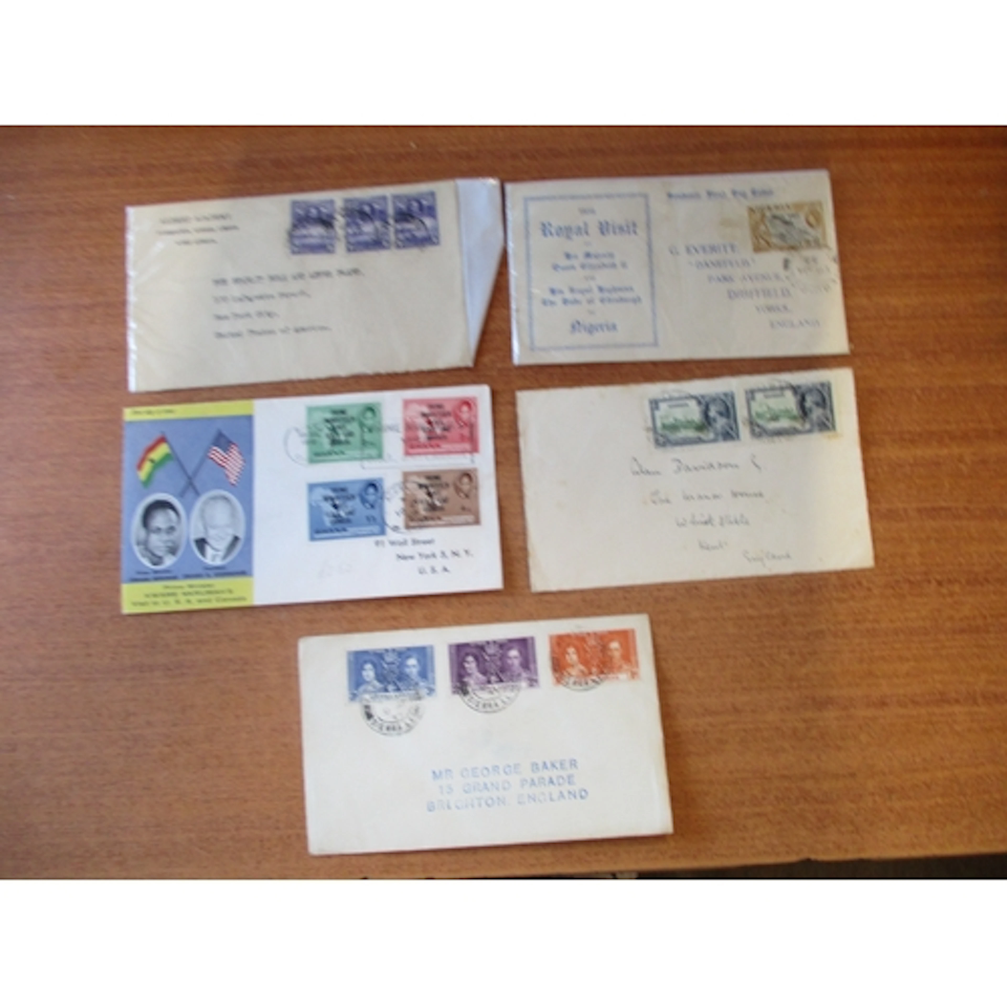 Nigeria. Range of unsorted covers and cards with a range fro...