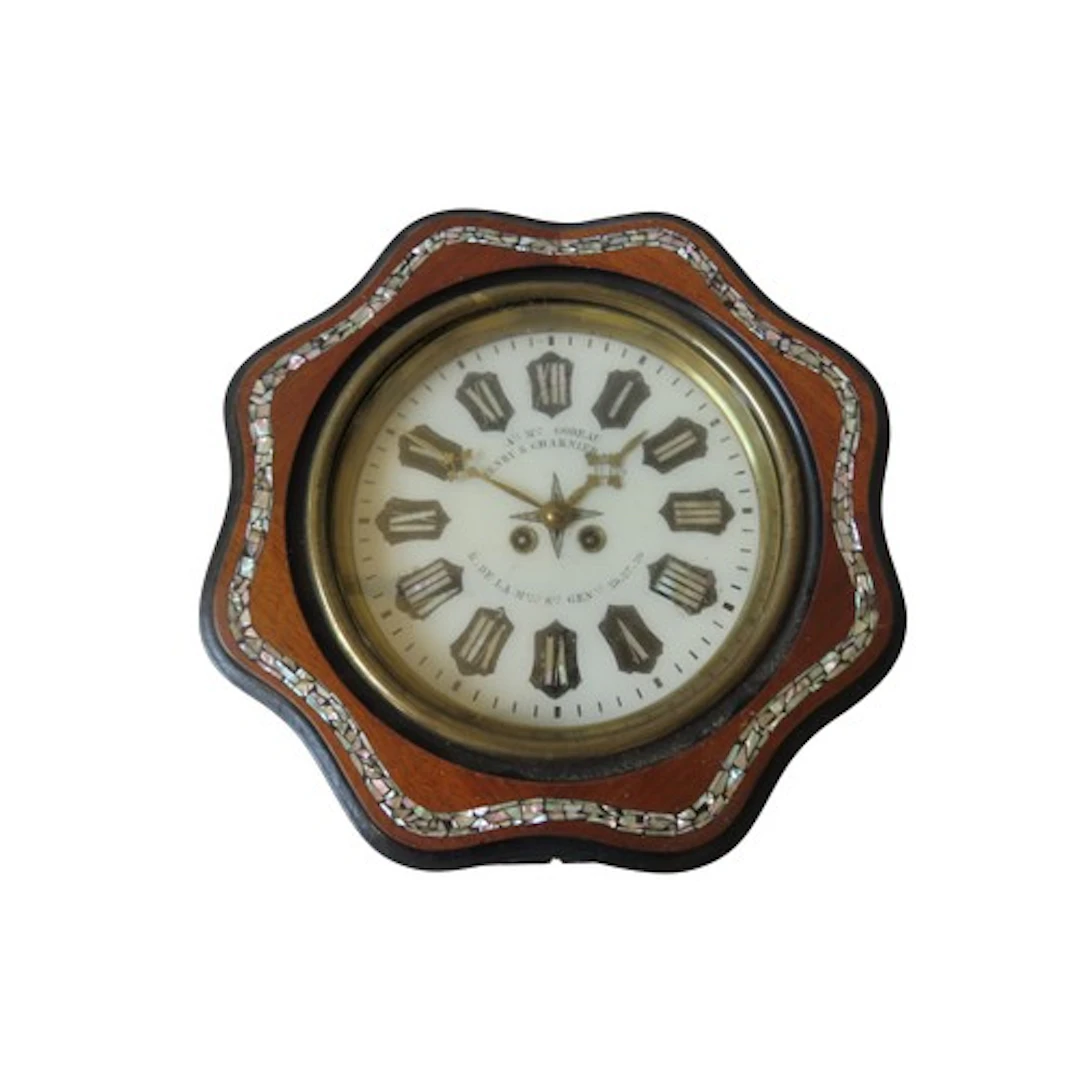 A FRENCH NAPOLEON III MAHOGANY CASED WALL CLOCK the wavy edg...