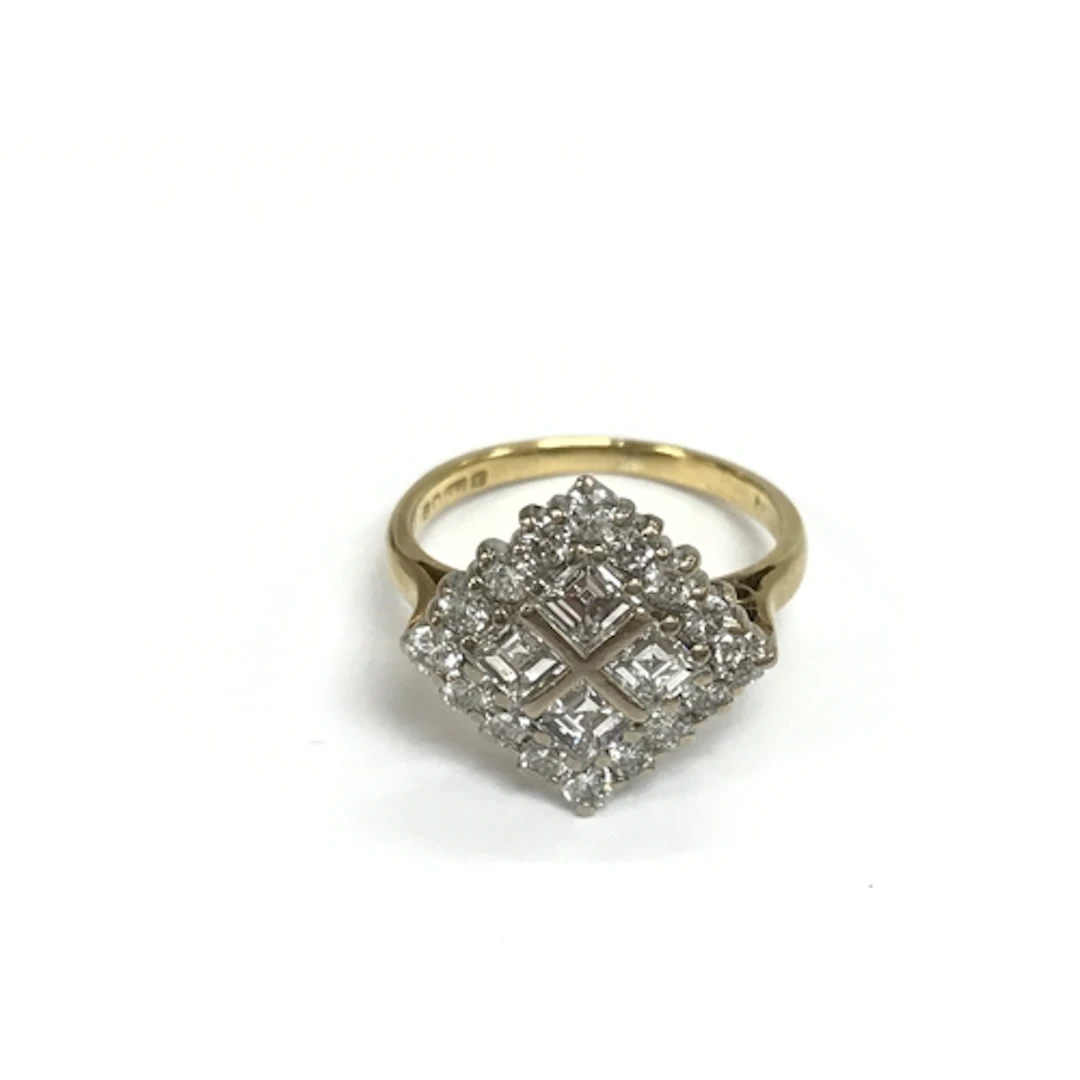 An 18ct white and yellow gold square ring set with princess ...