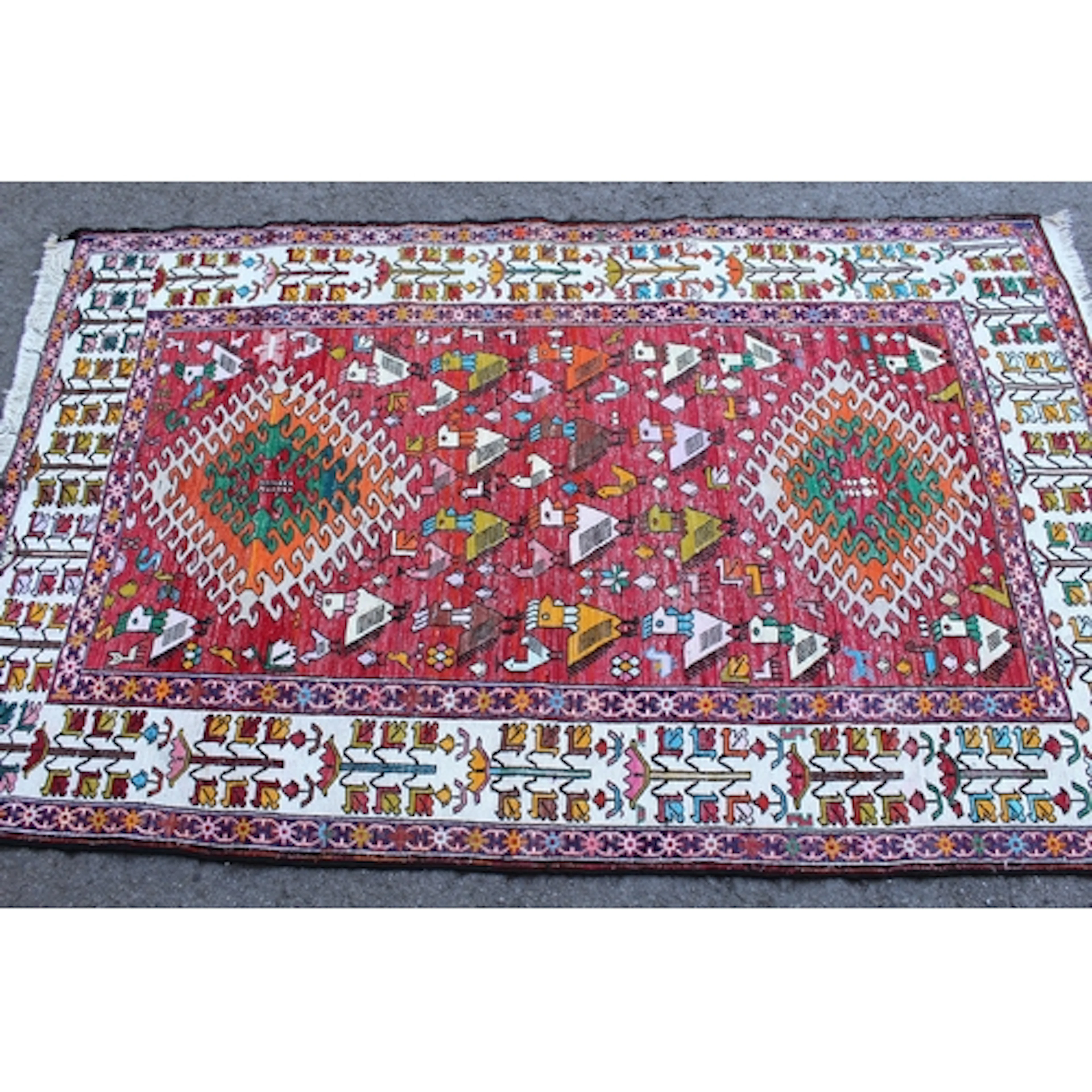 Soumak rug with a hooked medallion and all-over stylised bir...
