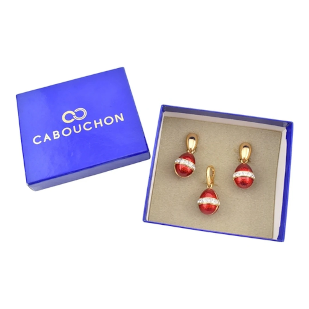 A cased Cabouchon enamel decorated earring an pendant set. T...