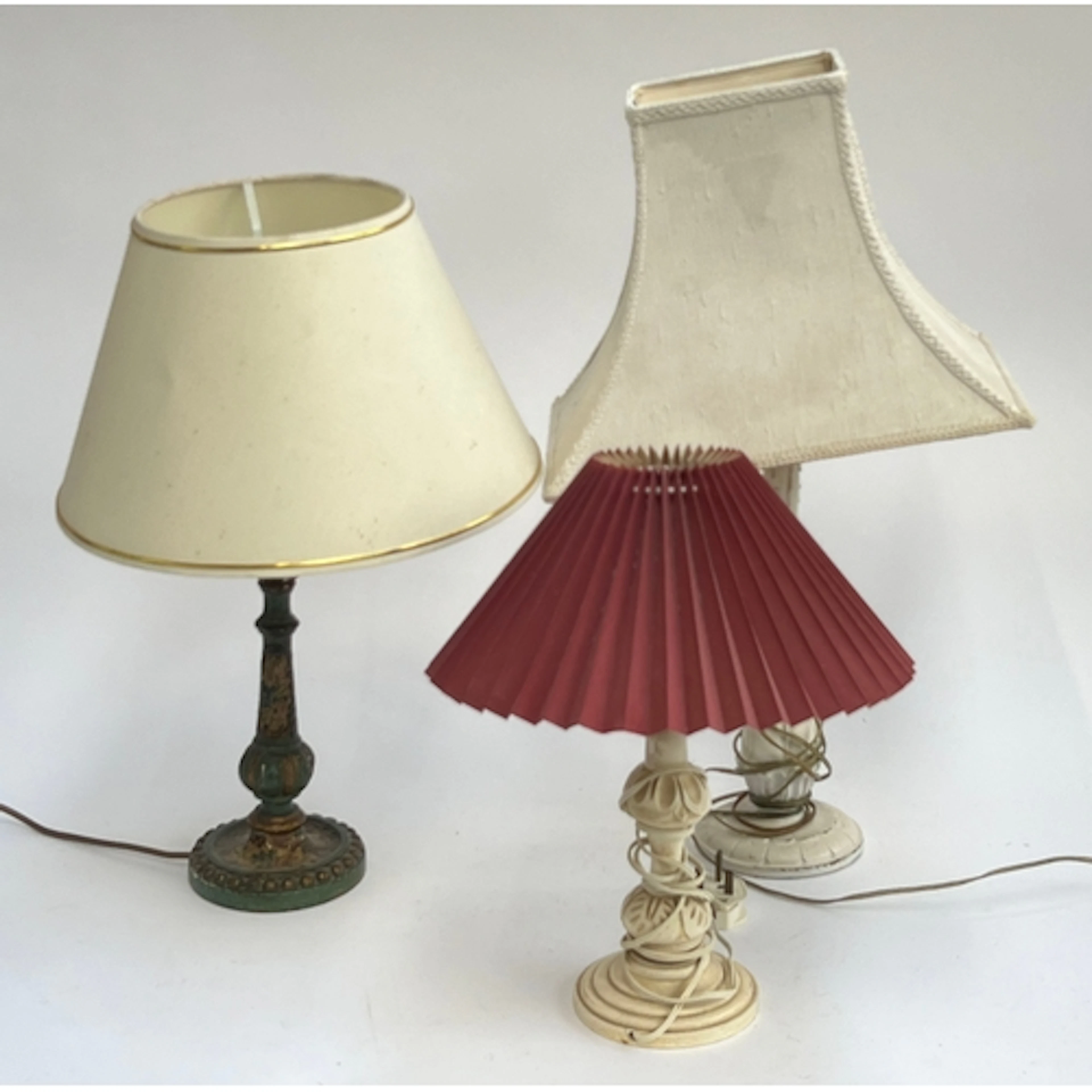 A mixed lot of table lamps to include a green painted and pa...