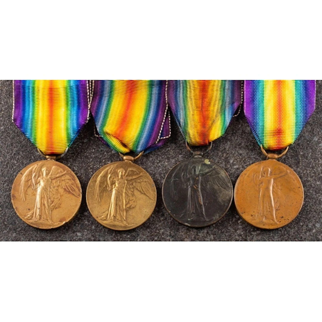 Four George V Victory Medals. 'T-21885 Dvr L C Rudduck ASC'...