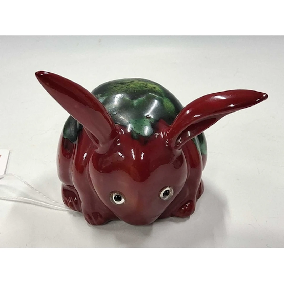A BERNARD MOORE RABBIT FIGURE, the hollow figure of a seated...