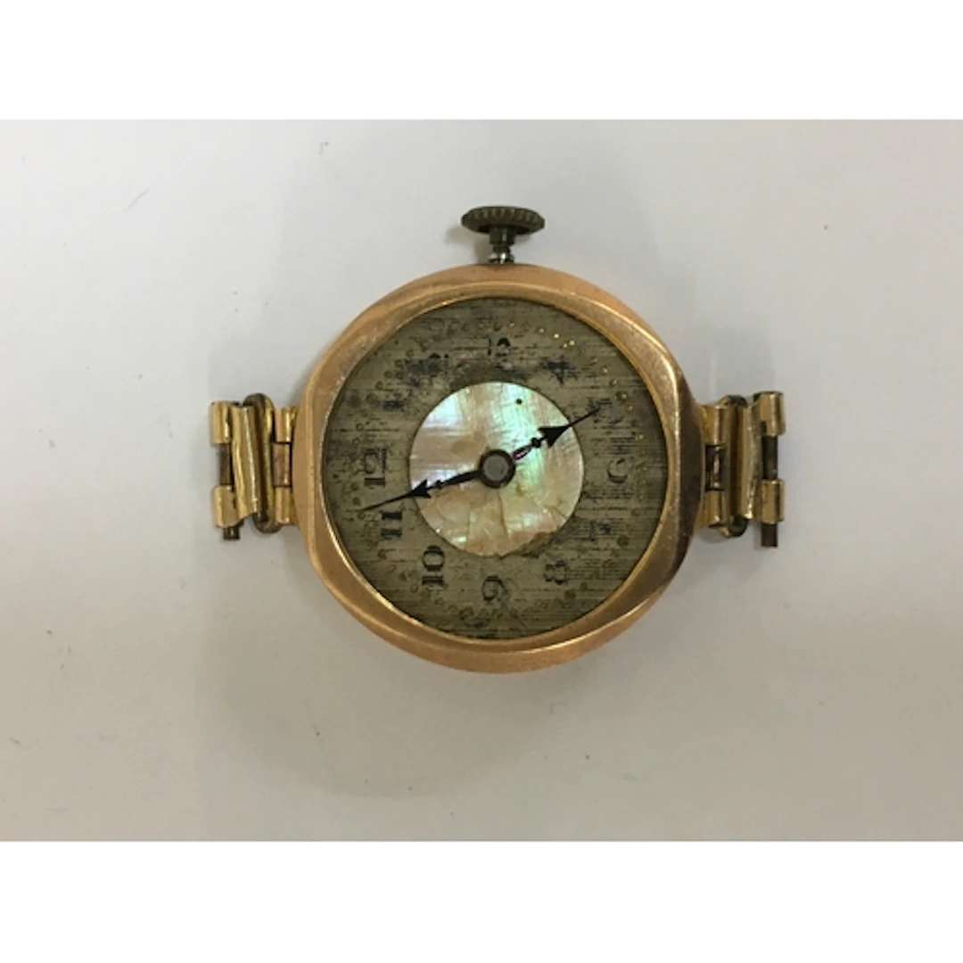 A 9ct gold antique watch face, offered as spares or repairs....