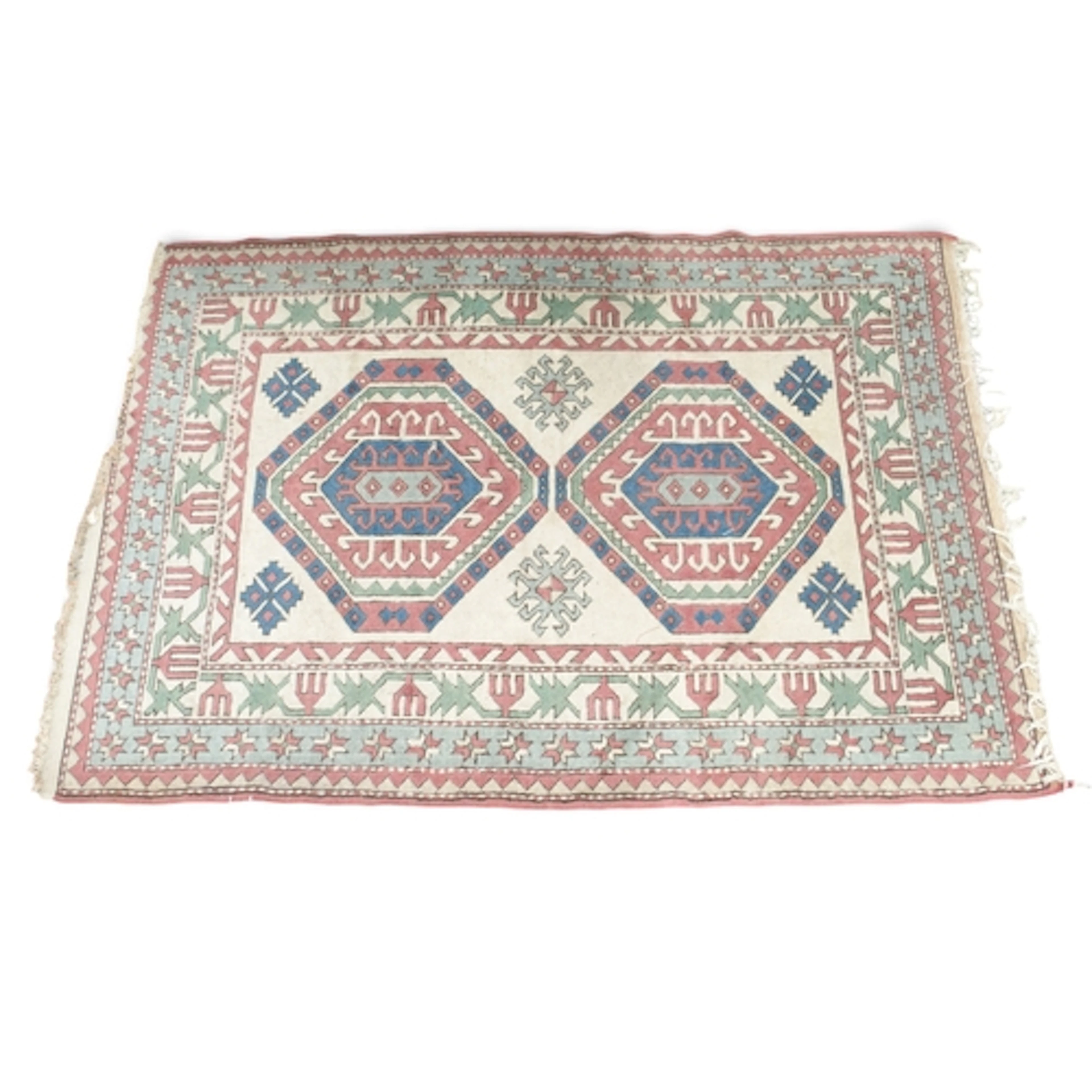 A white ground Turkish Shirvan rug with two octagonal multic...