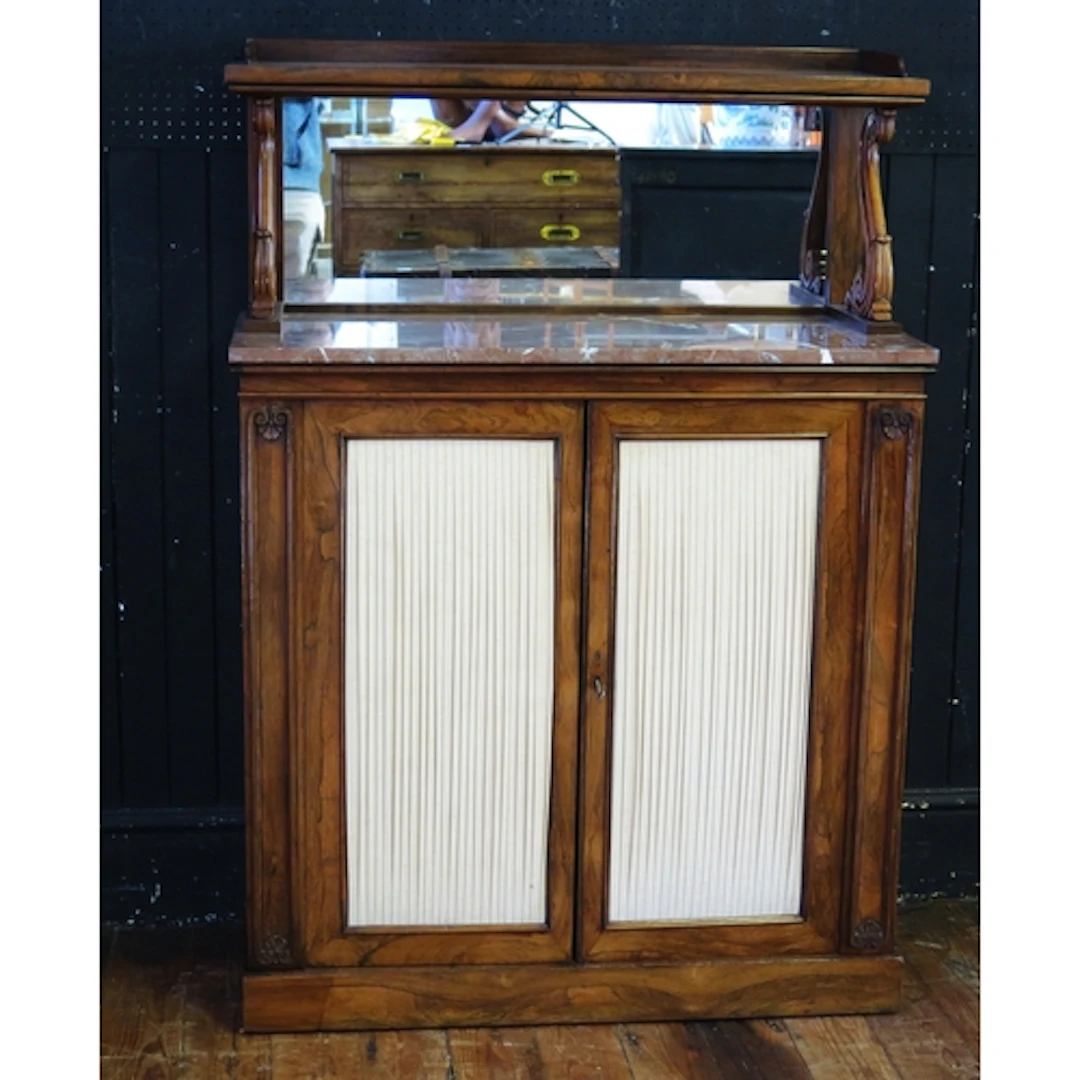 A William IV rosewood chiffonier, the shelved and mirror bac...