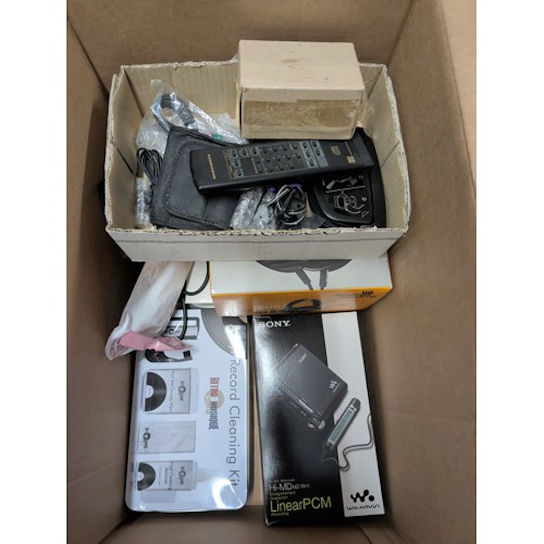 Box containing Beyer Dynamic headphones, Sony walkman, etc.