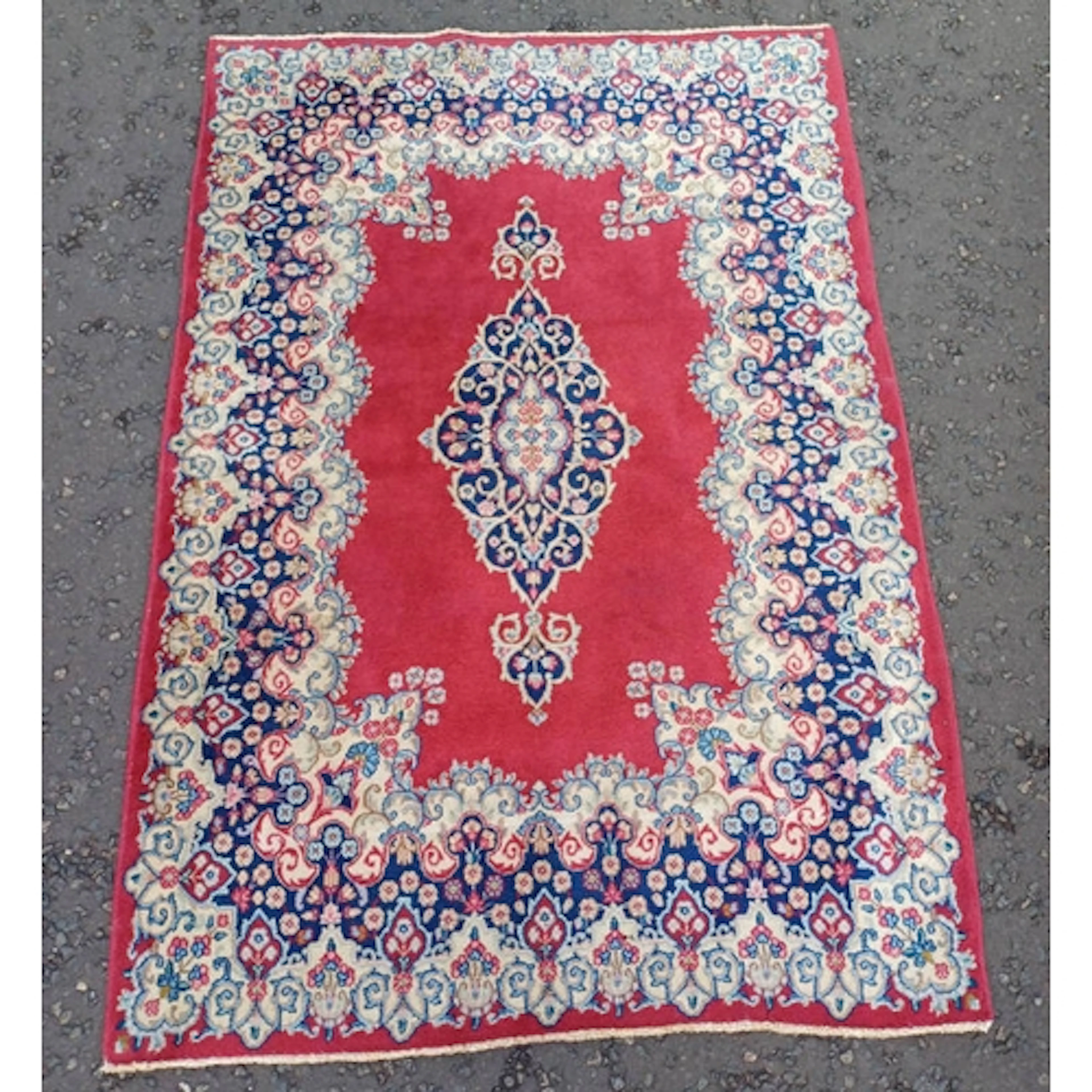 RICH RED GROUND KERMAN HAND WOVEN RUG WITH CENTRAL FLORAL ME...