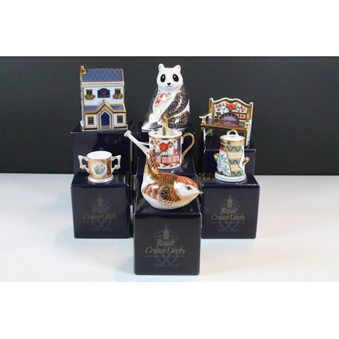 Three Royal Crown Derby paperweights, 'Panda', 'Goldcrest' a...