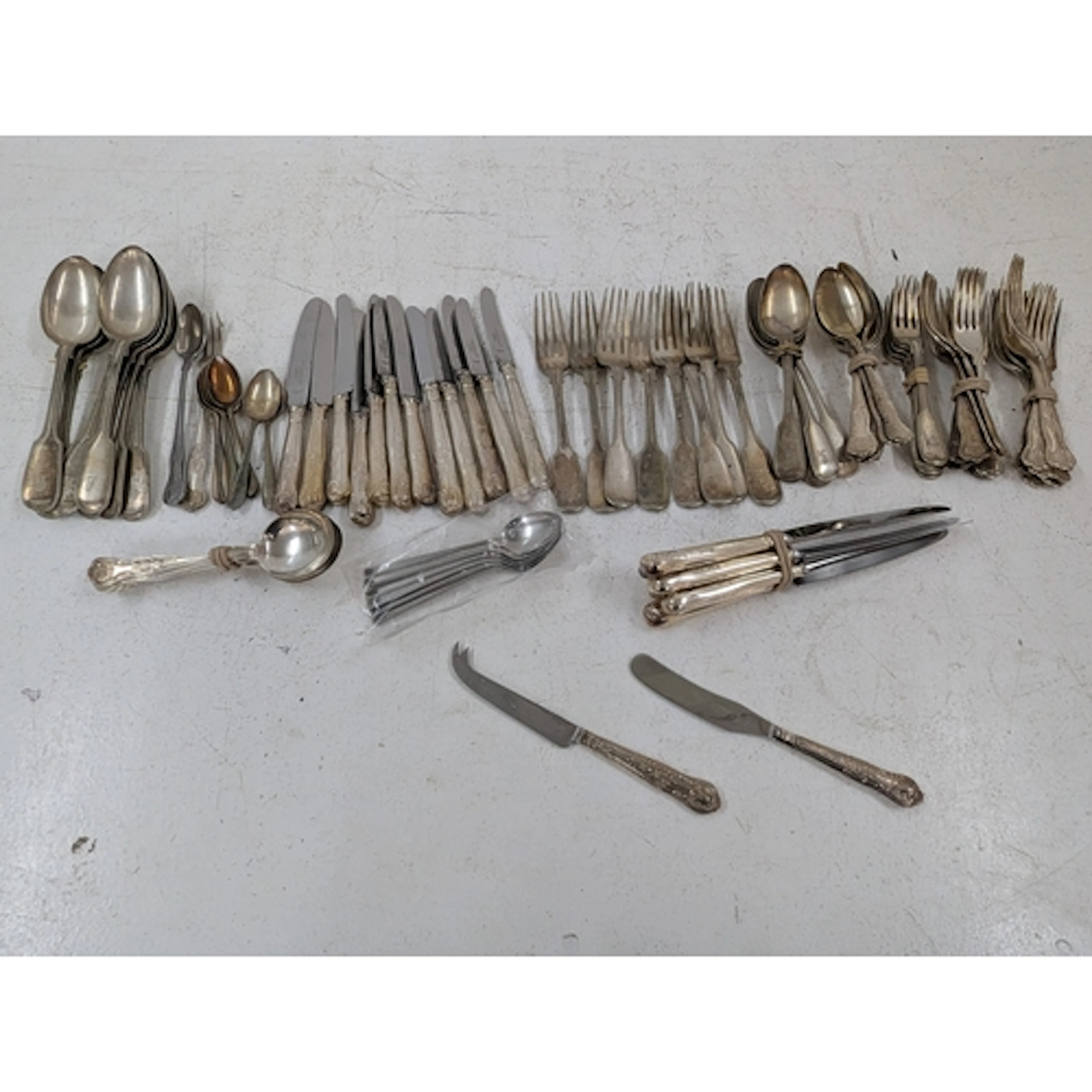 Silver-plated cutlery and flatware, together with silver-han...