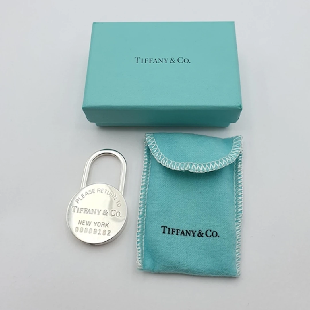 TIFFANY & CO: A silver Tiffany Padlock in original packaging...