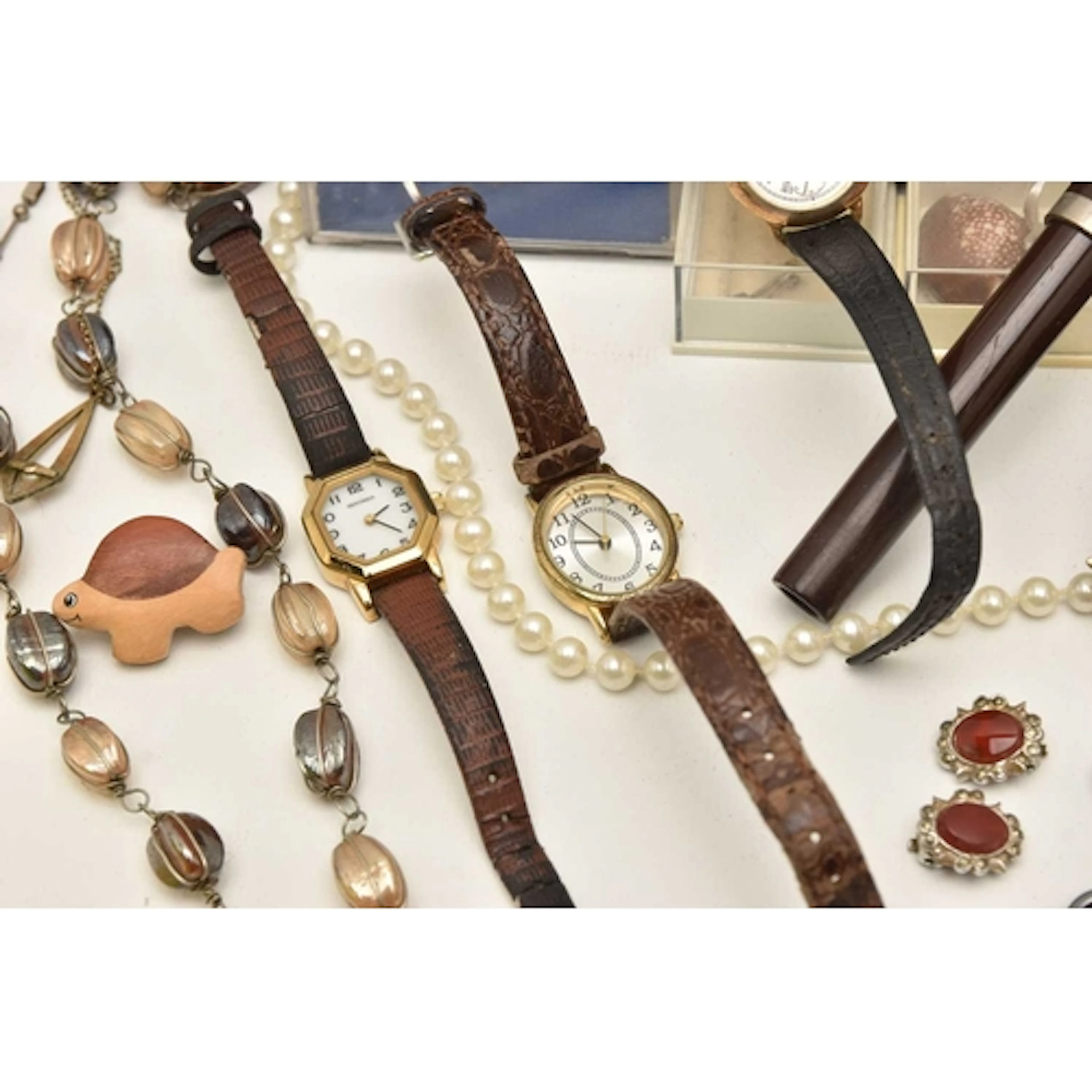 A SMALL BOX OF ASSORTED ITEMS, to include a boxed Sekonda wa...