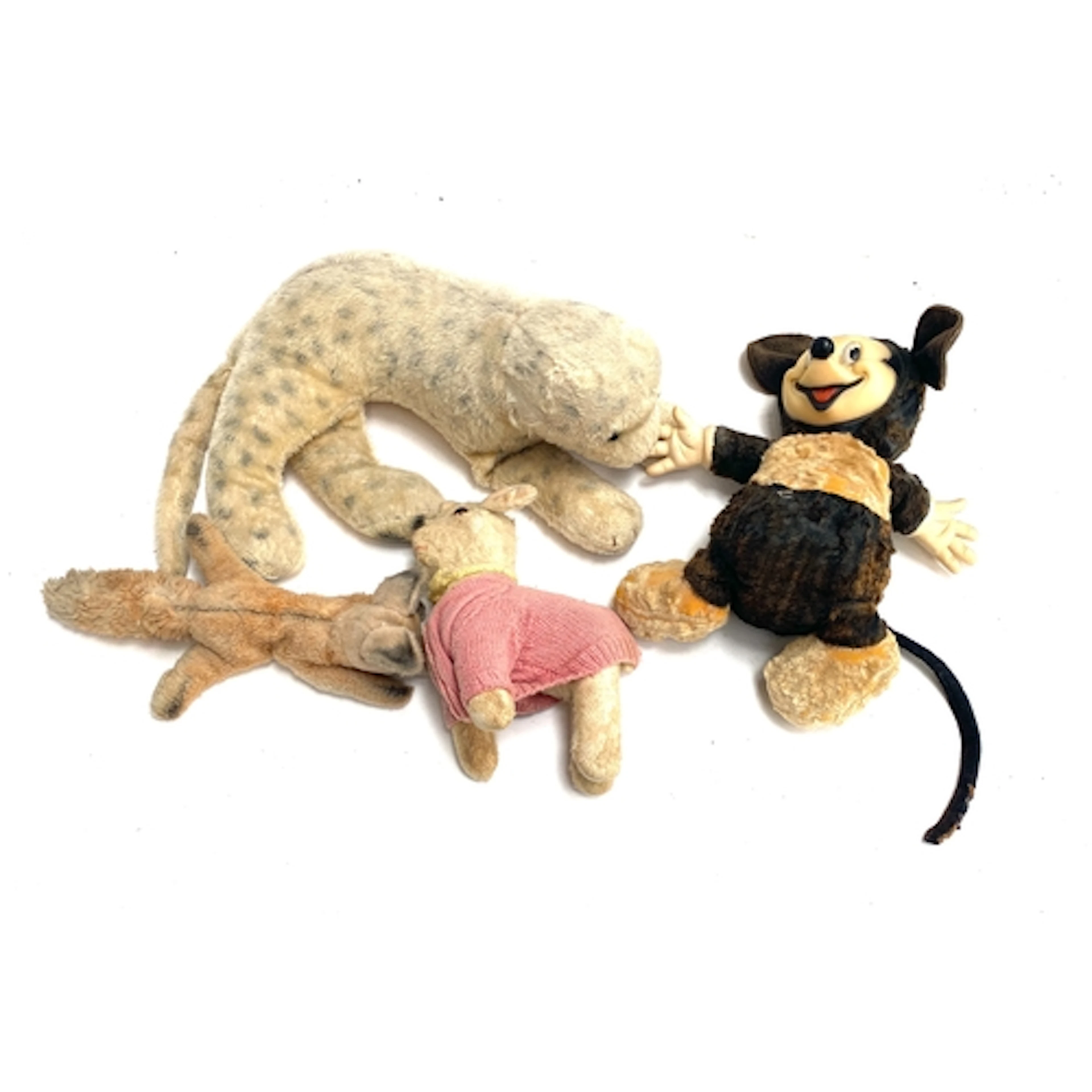 A vintage Mickey Mouse toy; together with a leopard, fox and...