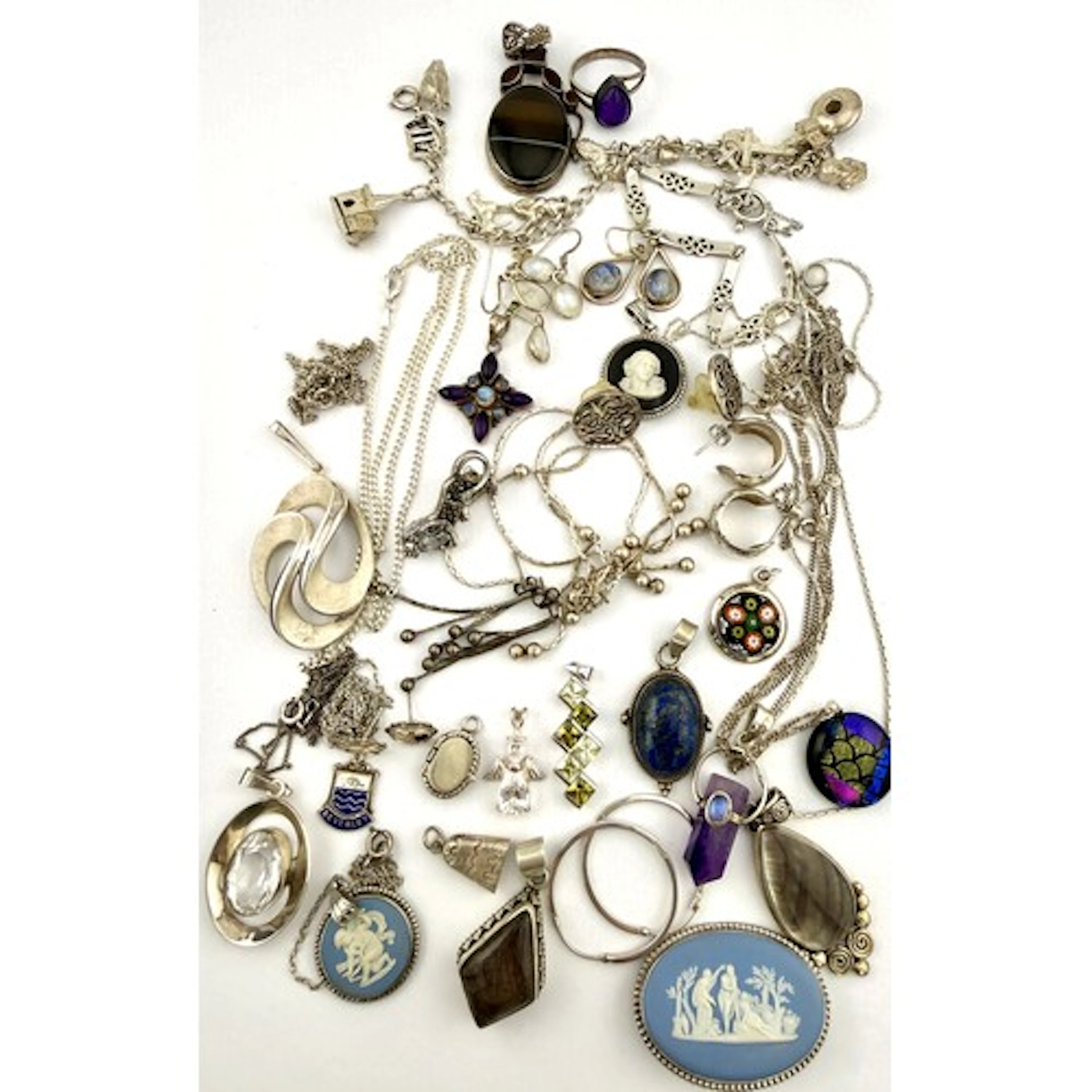 A collection of silver and white metal jewellery to include ...