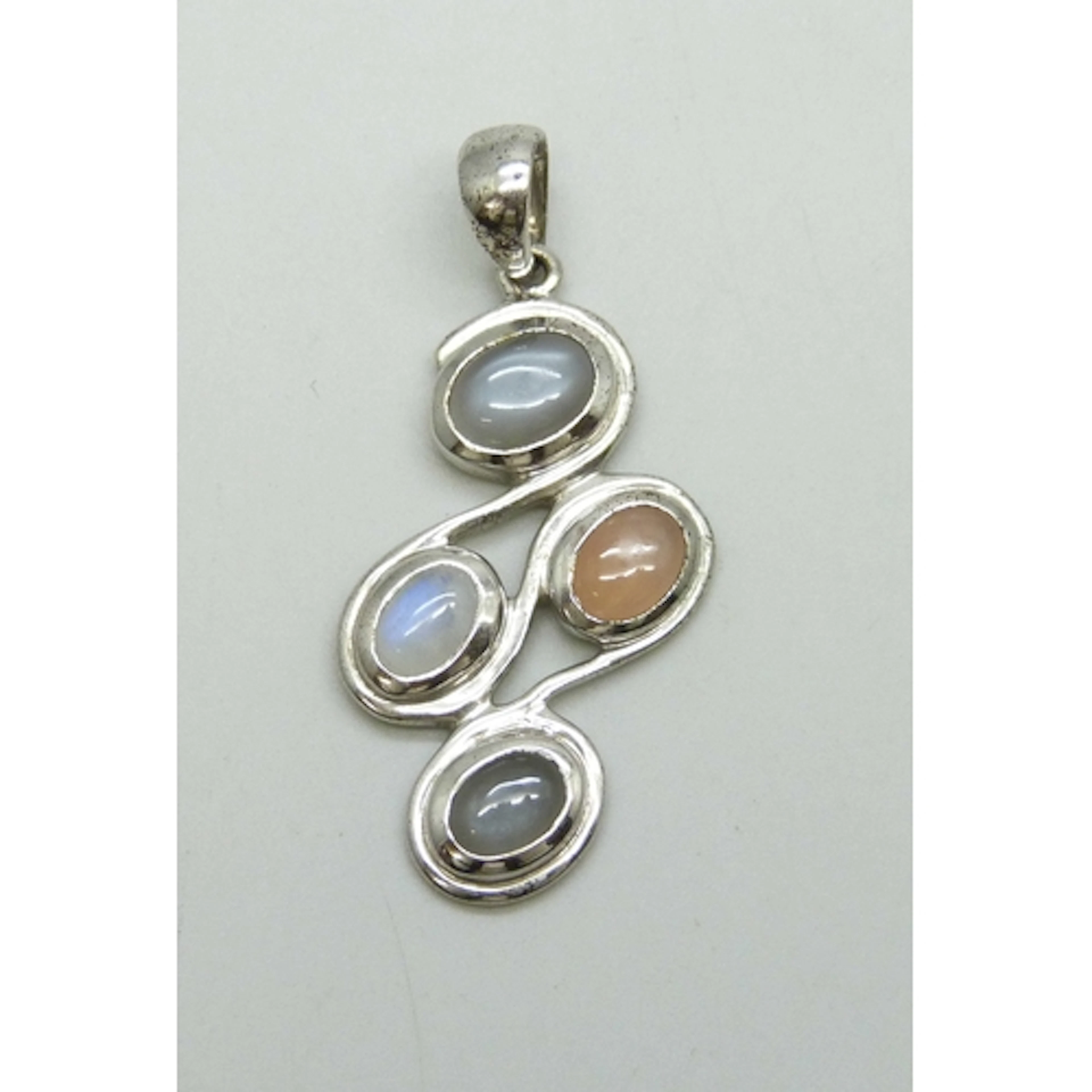 A silver and moonstone abstract design necklace pendant incl...